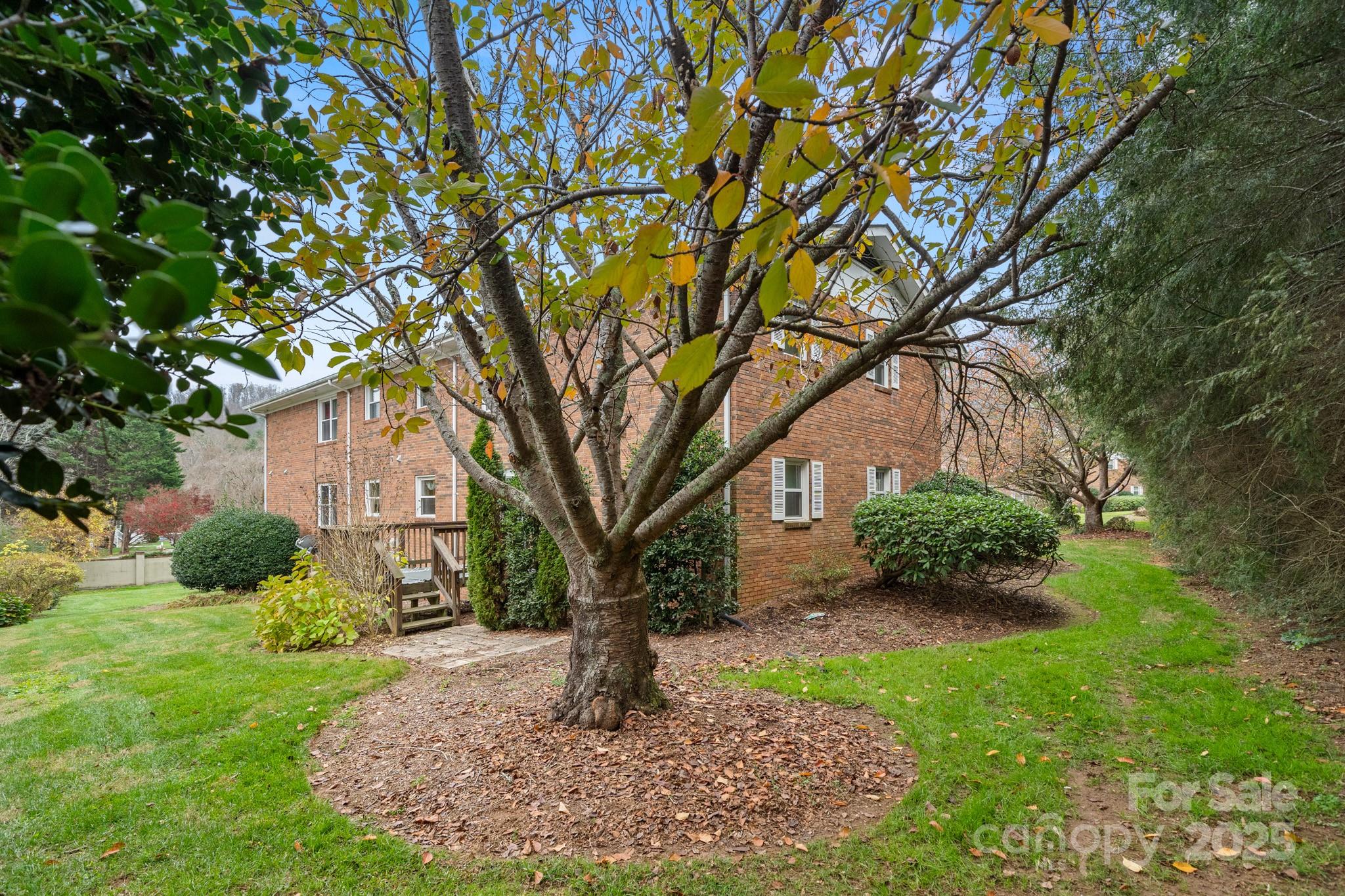 Invest Smart or Settle Down: Your Perfect Hendersonville Condo Awaits!

This isn't just a condo; it's a smart investment opportunity and the ideal turnkey home for a first-time buyer. Located just 1.5 miles from the vibrant heart of downtown Hendersonville, this cozy, main-level, end-unit offers unparalleled convenience and low-maintenance living.
Why This is a Prime Investment
• Exceptional Location: The proximity to downtown's booming restaurant, shopping, and festival scene ensures strong rental potential and consistent demand.  
• Ultimate Convenience: Benefit from a "lock-and-leave" lifestyle perfect for seasonal renters or busy professionals. You're only a 15-minute drive to the Asheville Airport (AVL) and the amenities of South Asheville, and less than an hour from Greenville, SC. Downtown Asheville is under 30 minutes away.
• Low Operating Costs: The maintenance-free exterior and all-inclusive HOA fees (covering city water, city sewer, garbage, and landscaping) minimize landlord responsibilities and maximize your net return.

Your Dream First Home:
• Move-In Ready & Stress-Free: Step into a light, bright, 2-bedroom, 2-bath unit that is completely move-in ready. Forget the exterior chores—your weekends are free!
• Desirable Features: The home boasts beautiful engineered wood flooring throughout. This is the only available unit with a large, private back deck, creating your own secluded oasis for relaxing, entertaining, or quiet bird watching.
• Parking Perks: Two vehicles are allowed, and there is ample guest parking—a rare and valuable commodity.
• Home Warranty provided by Seller!!! 

Secure your stake in one of Western North Carolina's fastest-growing markets. This unique combination of location, condition, and value won't last.

Don't miss the chance to own a piece of Hendersonville's thriving community. Ready to tour this exceptional opportunity?