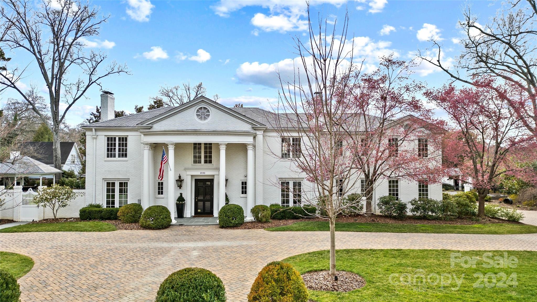 Introducing 1930 Queens Rd W, a timeless Myers Park home that captivates the essence of Charlotte's old-world charm. Nestled on an expansive double lot spanning a full acre, this 7300 sq/ft property with private guest house boasts, 6 beds, 5 baths, and 3 half baths. Step into the lush surroundings of this rare gem, where a stunning lap-size pool, spa, and multiple outdoor living spaces await. The property's artificial turf and bluestone hardscape provide a serene setting for relaxation and entertainment. Beautifully updated with traditional features like crown molding, hardwoods, custom built-ins, and marble finishes, this home offers a perfect blend of modern amenities and enduring elegance. Guest home overlooks the picturesque pool and offers a haven of comfort, sophistication, and privacy, with 1 bedroom, 1.5 bathrooms, a modern kitchen, and an upstairs gym. This property is a true testament to unparalleled hospitality and refined living.  PRE QUAL/PROOF OR FUNDS REQUIRED TO SHOW!