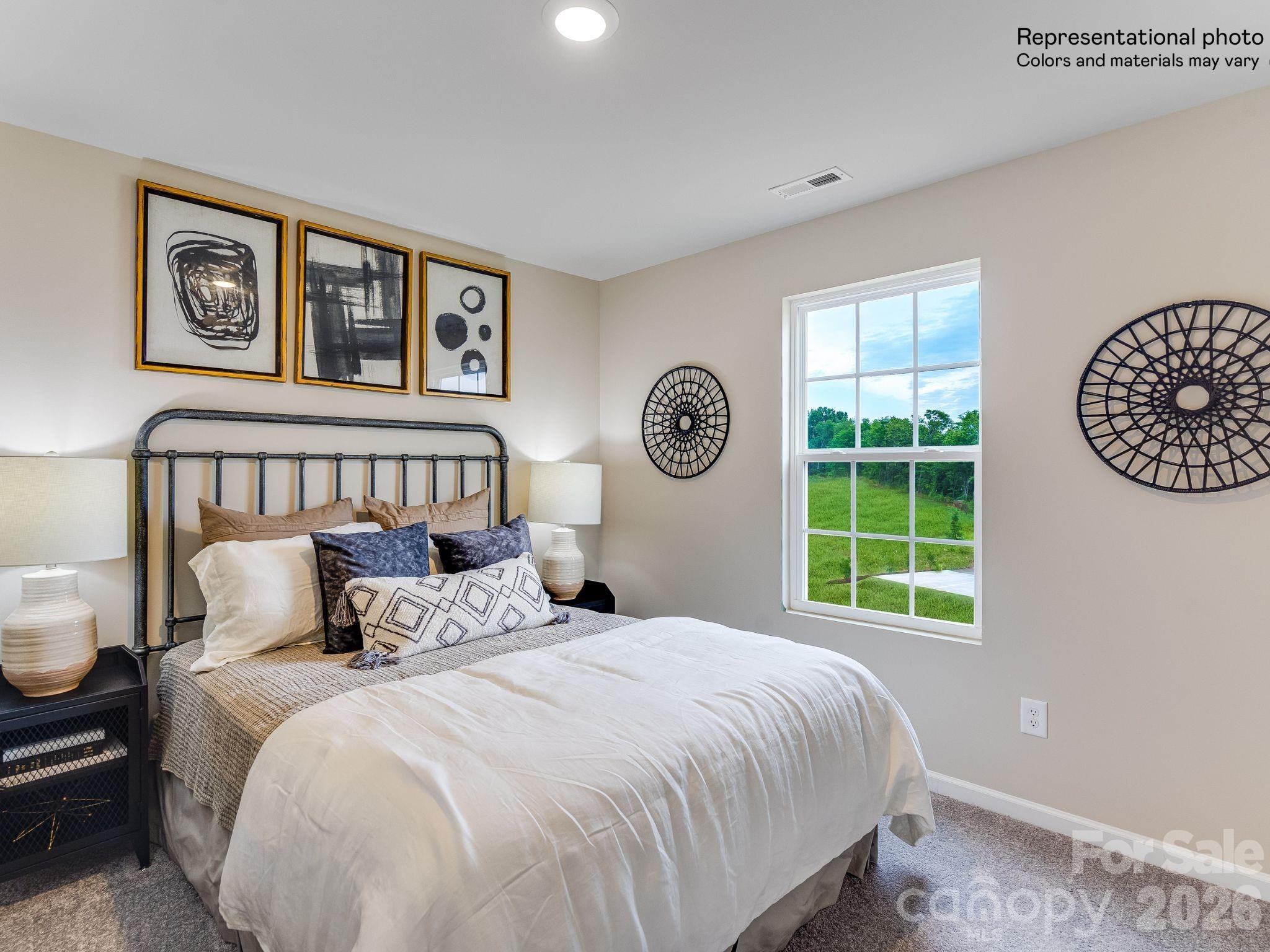 This single family home hosts the guest bedroom and full bath on the main floor. A spacious open floorplan that connects an inviting Great Room, breakfast nook and kitchen offering quartz countertops, tile backsplash and gas range. Located upstairs is the primary bedroom with two large walk in closets, large bonus room, and 3 additional bedrooms and full bath. Luxury vinyl plank flooring, quartz tops in the kitchen and tile backsplash at no extra cost! Cannon Village is a master-planned community offering new single-family homes and townhomes to a great location in York, SC. Future amenities will include a swimming pool, cabana, and dog park. 

We have three beautifully decorated models...1 single family and 2 townhomes!
