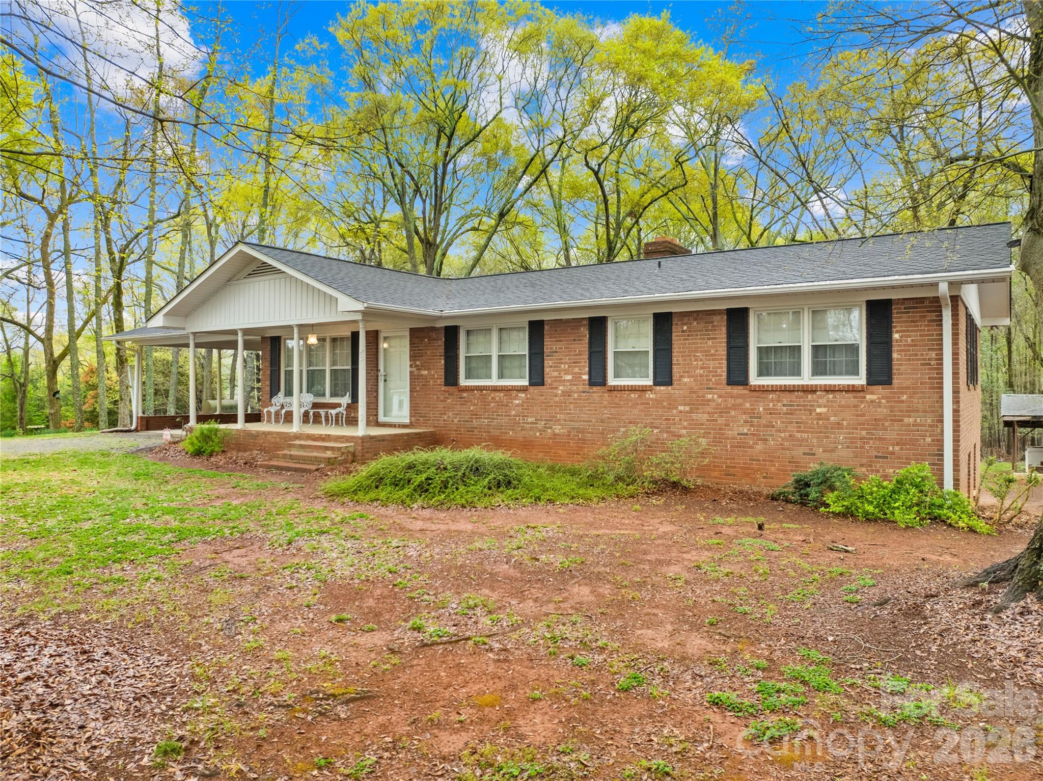 Welcome to one of the most unique land offerings in Boiling Springs. +/- 26 acres of gently rolling, partially wooded land that borders Gardner-Webb University. Whether you’re an investor, developer, or visionary buyer, this property presents an unmatched opportunity to create something truly special. With +/- 281 feet of road frontage, a peaceful creek on the property, the land offers both beauty and versatility. The setting feels private and serene, yet it’s just a short walk from the center of town, campus, and key amenities. Tucked on the front portion of the property sits a well-built 3-bedroom, 2-bath brick ranch with an unfinished basement, offering immediate rental or renovation potential while plans are made for the rest of the acreage. Boiling Springs is growing — and this is your chance to invest in one of its most promising parcels. Whether your vision is residential, educational, or something entirely new (buyer to verify use), this land is ready to be transformed.