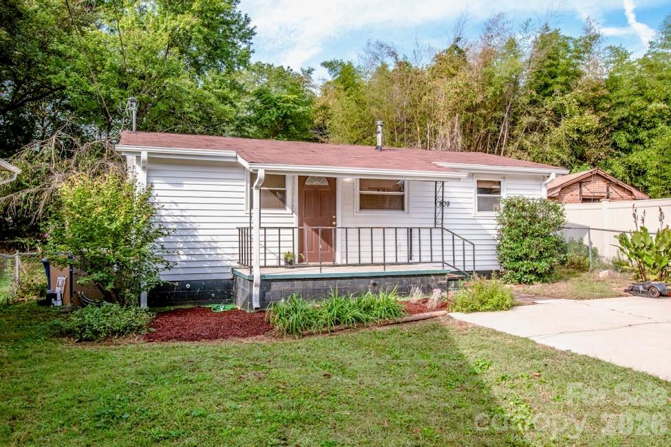 BACK ON MARKET - Price was REDUCED $8,000. Don't miss your chance to view! This home had a new roof in 2024 and new plumbing and new hot water heater in 2024! New Back Deck 2025. New shower wall insert in 2025.  HVAC 2021. HOME NEEDS WORK. BEING SOLD AS IS - WHERE IS** If you are handy or looking for an investment property look no further! Close to 40 and 77 - Great location! Please reach out with any questions you may have! Enjoy sitting on your covered front porch or grilling out on your new back deck! Relax in the living room which is centrally located to the bedrooms, bathroom, laundry room and kitchen.  Looking to close quickly? We can accommodate a quick close! This home is a must see and won't last! Price reduced $8,000 due to needing repairs. An estimate for repairs was obtained after price was lowering and can be shared. Washer, dryer and refrigerator can convey.