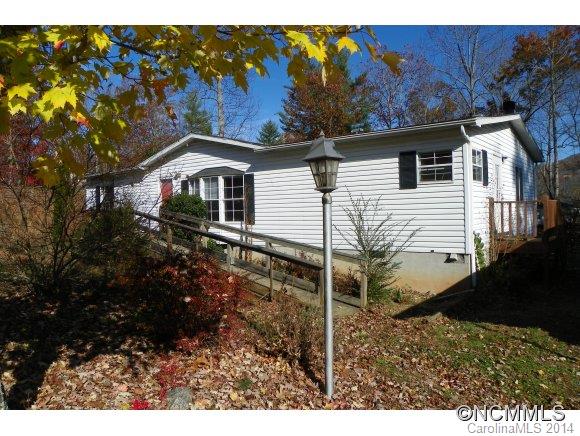 Sold As-is this property has loads of potential in a nice quiet neighborhood that holds it's value well.  Close to the interstate for convenience to Asheville and Weaverville.  Home needs TLC  but has a solid rental history at 850 per month.  Nice carport with attached storage area on a nice lot with mountain views.  Price to move quickly.....take a look today!-