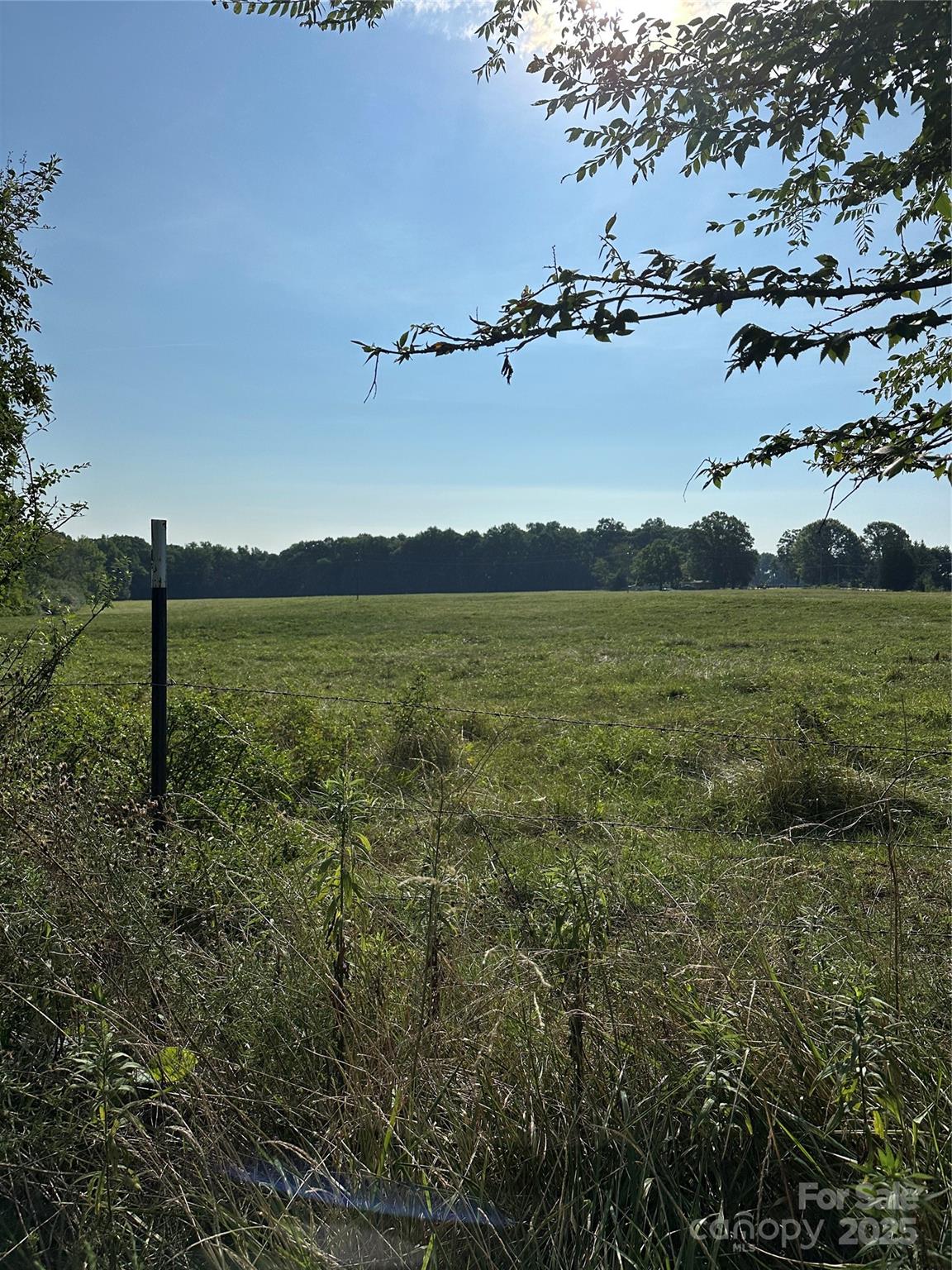 The foregoing property is restricted to single-family, residential use only. The foregoing restrictions shall be binding on the purchaser,  his or its heirs, successors and assigns and the same shall run with the property, included any portion subdivided from the twenty-three acres for a period of fifteen (15) years. No commercial activity is permitted on the foregoing property, including but not limited to no mining or mineral extraction and no solar or wind uses. No manufactured homes are permitted on the foregoing property. If the forgoing property is subdivided, individual lots shall be not less than two acres in size and all lots subdivided from the foregoing property shall be subject to the foregoing restrictions. Any dwellings constructed on the property shall have at least 1500 square feet of heated area, exclusive of porches, carports, garages, and storage areas. No more than one dwelling shall be constructed on any parcel. Livestock present so please keep all gates closed.