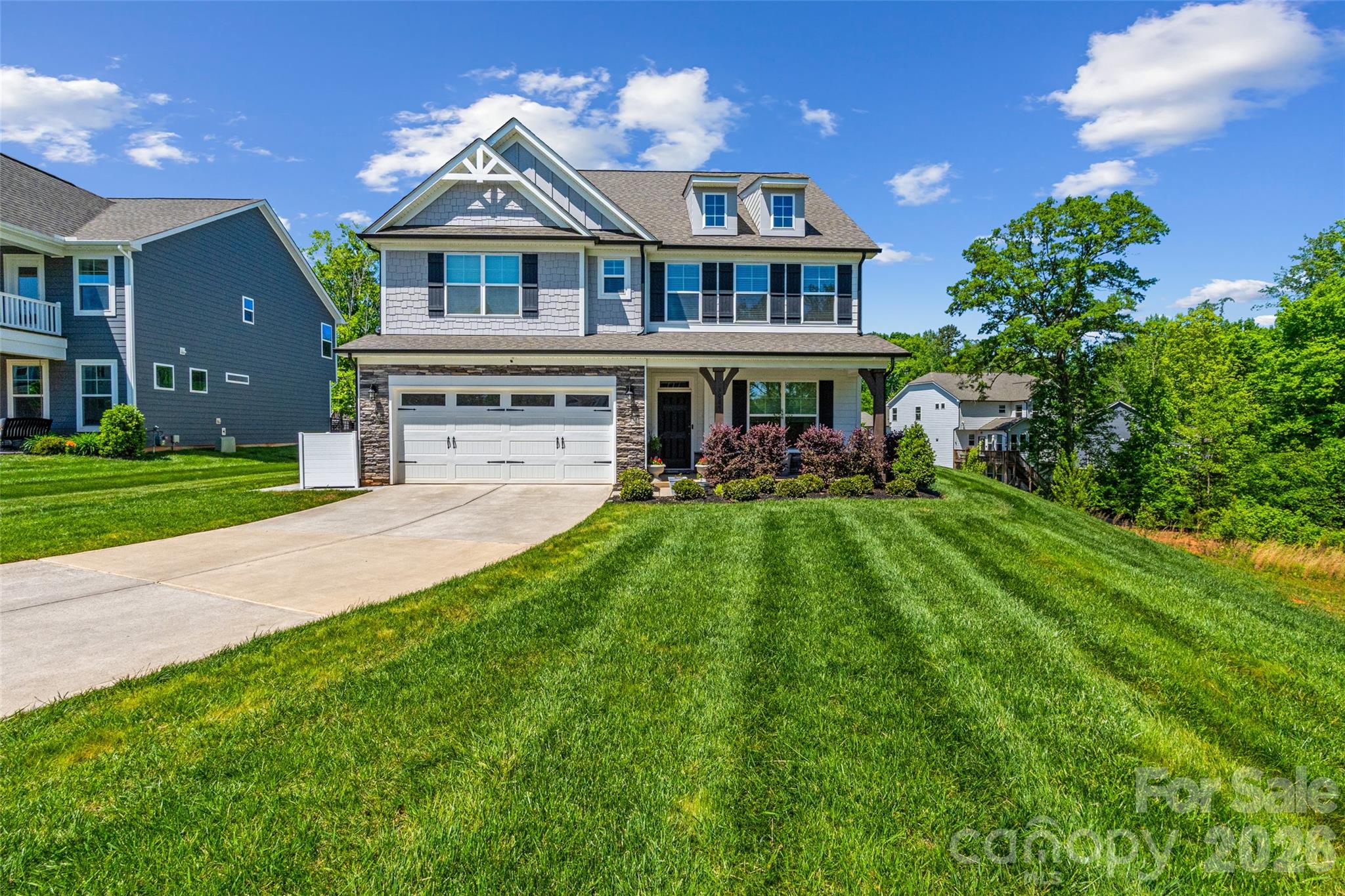 Stunning 6-bedroom, 5-bath home featuring thoughtful upgrades and modern conveniences throughout. The main level includes a beautifully enhanced office with custom wall detail, built-in cabinetry, and a stylish gold light fixture. Designer touches continue in the guest bath with eye-catching wallpaper, along with elegant wall molding along the stairwell.

Storage and organization are exceptional, with custom closet systems installed by California Closets in the primary suite, pantry, third-floor closet, and main-level bedroom. The home is equipped with hardwired internet and a smart home system through CPI, offering seamless connectivity and security.

Outdoor features include a smart irrigation system, a paved patio area for garbage containers, and added privacy with newly planted trees along the fence line. Enjoy your own fruit-bearing trees, including two apple, two pear, and one peach tree.

This spacious and well-appointed home combines functionality, comfort, and style—perfect for modern living.