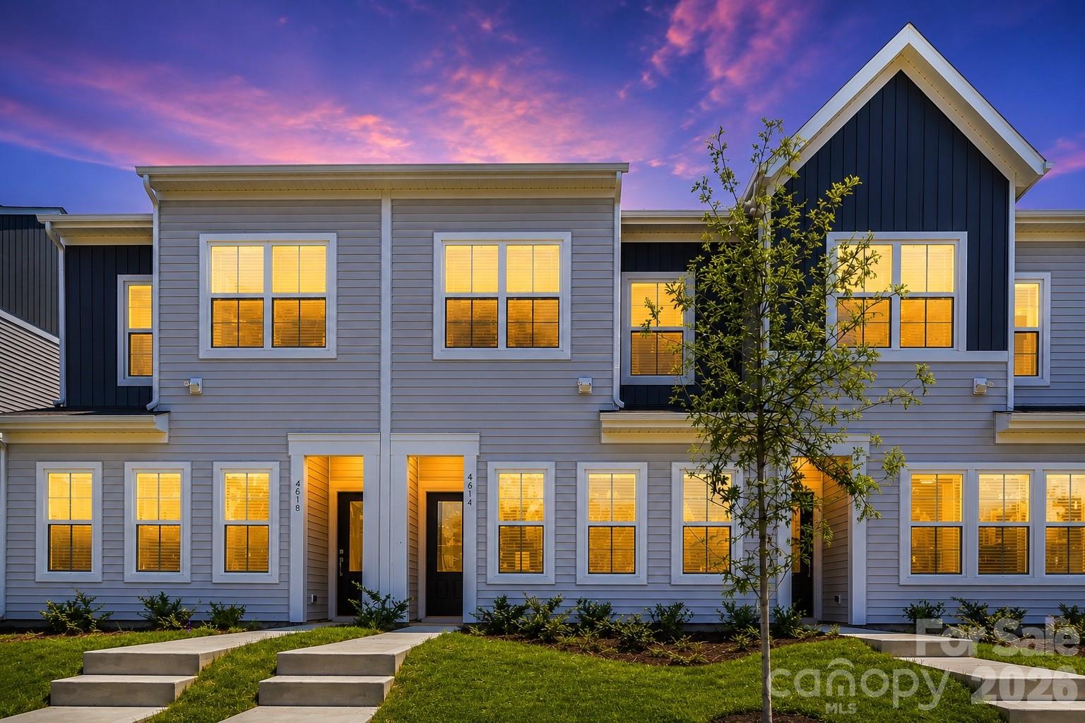 Discover the perfect combination of luxury, convenience, and thoughtful design at Lakeview Village by Mungo Homes. Minutes from uptown charlotte, this beautifully crafted townhome offers an inviting open layout featuring 9-foot ceilings, luxury vinyl plank flooring, and abundant natural light. The designer kitchen showcases quartz countertops, soft-close cabinetry, stainless steel appliances, and a spacious island that seamlessly connects the living and dining areas. A convenient mudroom provides additional organization while ample storage throughout the home keeps everyday living clutter-free. Upstairs, the elegant primary suite features a tray ceiling, generous walk-in closet, quartz dual vanity, and a tiled walk-in shower designed for everyday luxury. Conveniently located near Center City Charlotte, Riverbend Village, Northlake Mall, Charlotte Douglas International Airport, I-77, and I-485, you'll enjoy exceptional accessibility to shopping, dining, and entertainment. Ask about current builder financing incentives and move-in promotions.