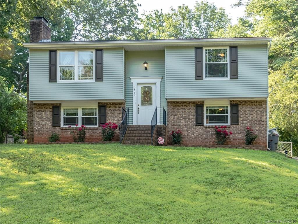 Charming split-entry home featuring incredible living space w/great room, kitchen & breakfast area plus 2 bedrooms w/full bath on main level. Lower level features Master Bedroom with fireplace & full bath. Additional BR on lower level, mud room & laundry room. Upgrades include granite, tile, iron balusters, laminate hardwoods throughout, newer appliances, lighting & fixtures. Fabulous outdoor living with large deck overlooking fenced-in private backyard. Walking distance to elementary school!