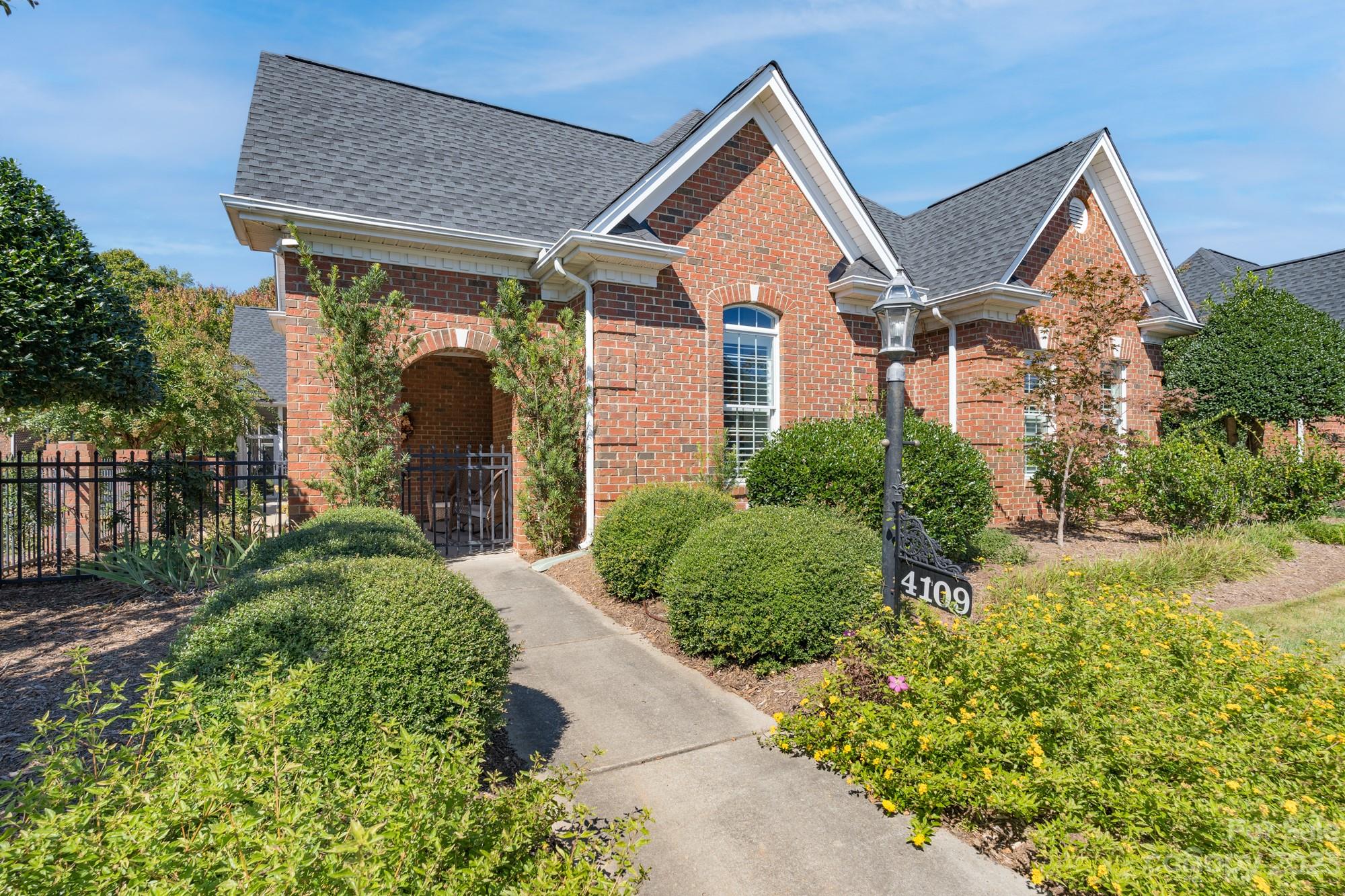 Bring your dream list and start checking off the boxes as you walk through this home.  From the moment you approach the covered porch area and enter the foyer, you will be impressed.  It is perfect for entertaining with an open living room, dining room, kitchen, morning/sitting room, and breakfast area.  The kitchen, with a raised bar, features stainless appliances, including a new dual fuel range.  The primary suite is located on the main floor and features a newly updated primary bathroom.  In addition, there is a second bedroom and full bath on the main floor.  Upstairs is home to a large third bedroom, expansive bonus/4th bedroom, and a full bath.  Take the entertainment outside to the incredible custom screened porch with tile floor.  With hardwoods throughout the main living areas, new carpet in bedrooms, custom built-ins, beautiful wood trim, plantation shutters, and fresh paint, this home that has been meticulously maintained is ready for new owners.  Come see all it offers!