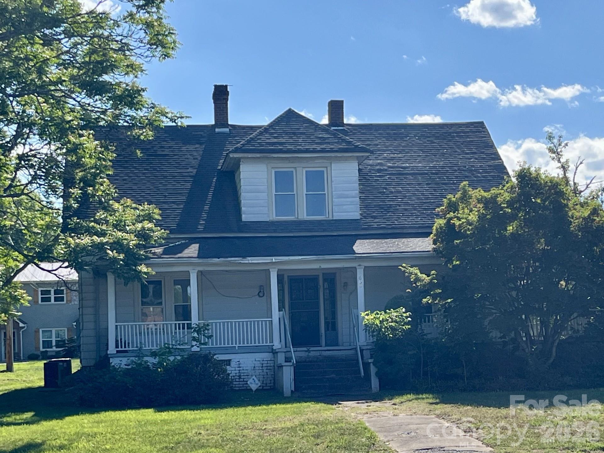 This two story structure is suited for two or three apartments or can accommodate one large family.  The first floor has over 1700 square feet and the upper floor has over 600 square feet.  There are three full baths.  The roof material is asphalt shingles.