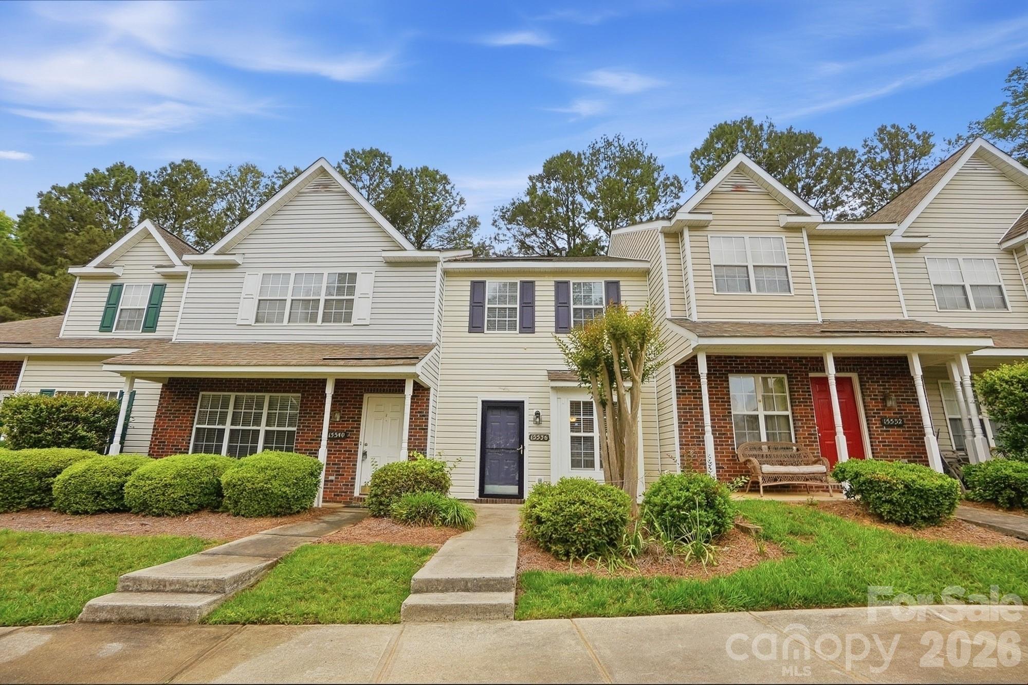 A rare opportunity to live in the established neighborhood of Maple Crest in Ballantyne. This inviting open floor plan features laminate wood flooring throughout the main level. The airy kitchen offers white appliances, light wood cabinetry, and a breakfast bar. The dining area opens to a secluded fenced backyard. Side-entry stairs lead upstairs to two generously sized bedrooms and a full bath. The primary bedroom features vaulted ceilings and dual closets. You won’t want to miss this charming home. Conveniently located near popular shopping, dining, and with easy access to I-485. Located in an award-winning school district!