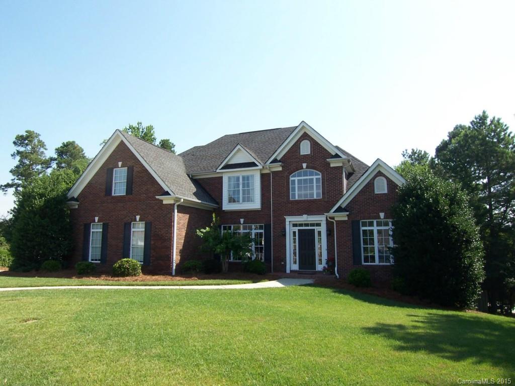 Beautiful full brick home Located in Ashford on the Water! This home offers a fully finished basement w/ a wet bar, media room, bonus room, workshop, & storage! The Foyer is more than welcoming! The main level boasts rich hardwood floors throughout! Kitchen features SS appliances, intricate tile backsplash, & work island! The spacious master suite is located on the main level! The outdoor paradise boasts in-ground pool, hot tub, outdoor kitchen, & patio!