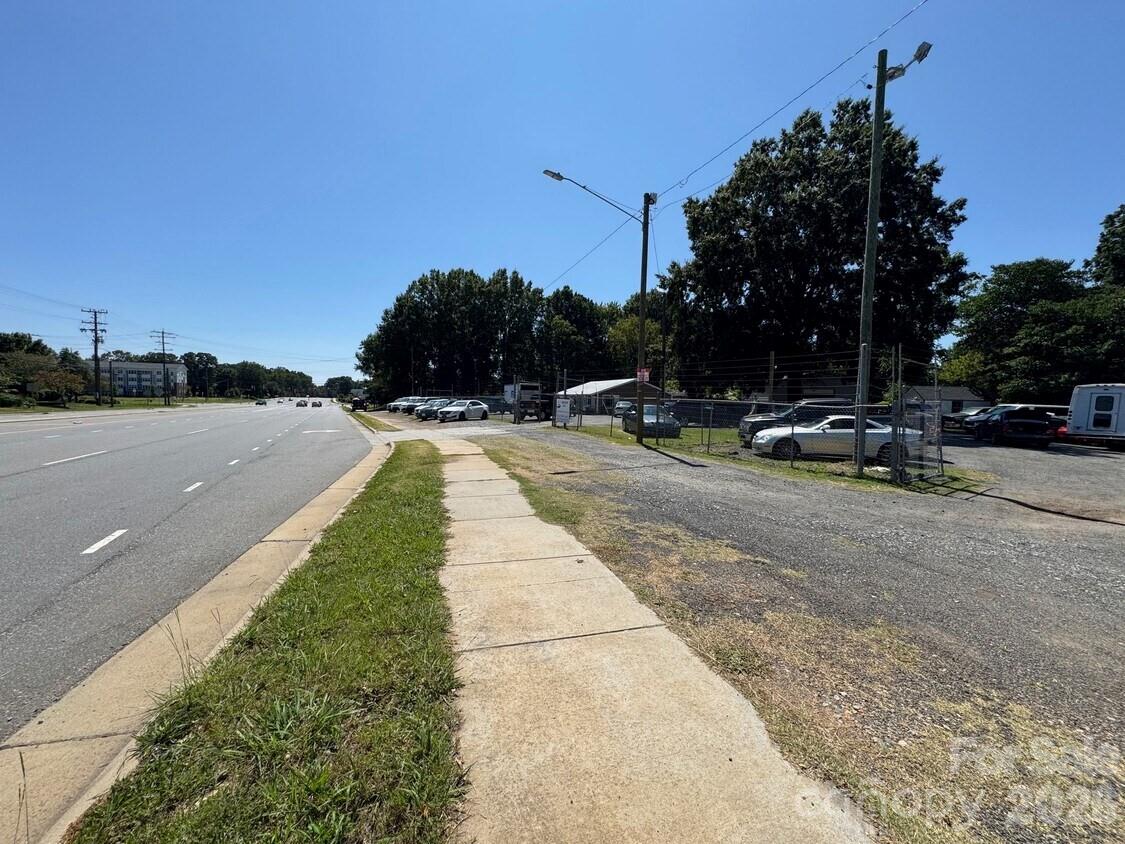 Car Lot for sale. Fully fenced. Currently leased - month to month. .76 acre, located on W Sugar Creek!
