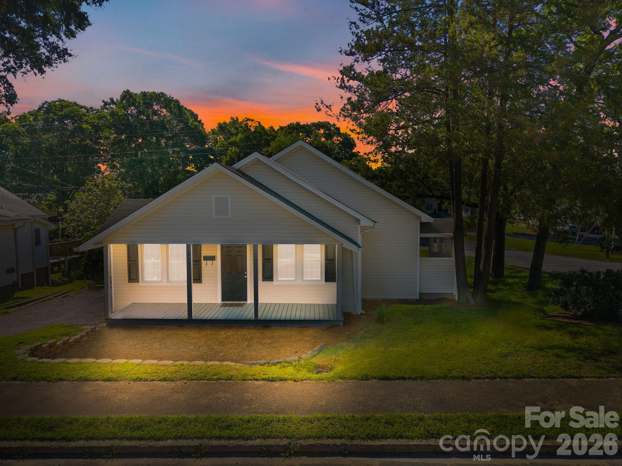 This well-maintained home is move-in ready and features fresh interior paint and new LVP flooring throughout. The property offers a spacious eat-in kitchen with a stainless-steel dishwasher. The two bedrooms are connected by a shared Jack-and-Jill bathroom, which includes a granite-topped vanity and tiled tub/shower surround.
Outdoor features include a covered front porch suitable for seating and an additional side porch located off the laundry/mud room. The home sits on a large corner lot with convenient access to Downtown Kannapolis attractions and I-85. Some photos include virtual staging for visualization purposes. Showings are available by appointment.