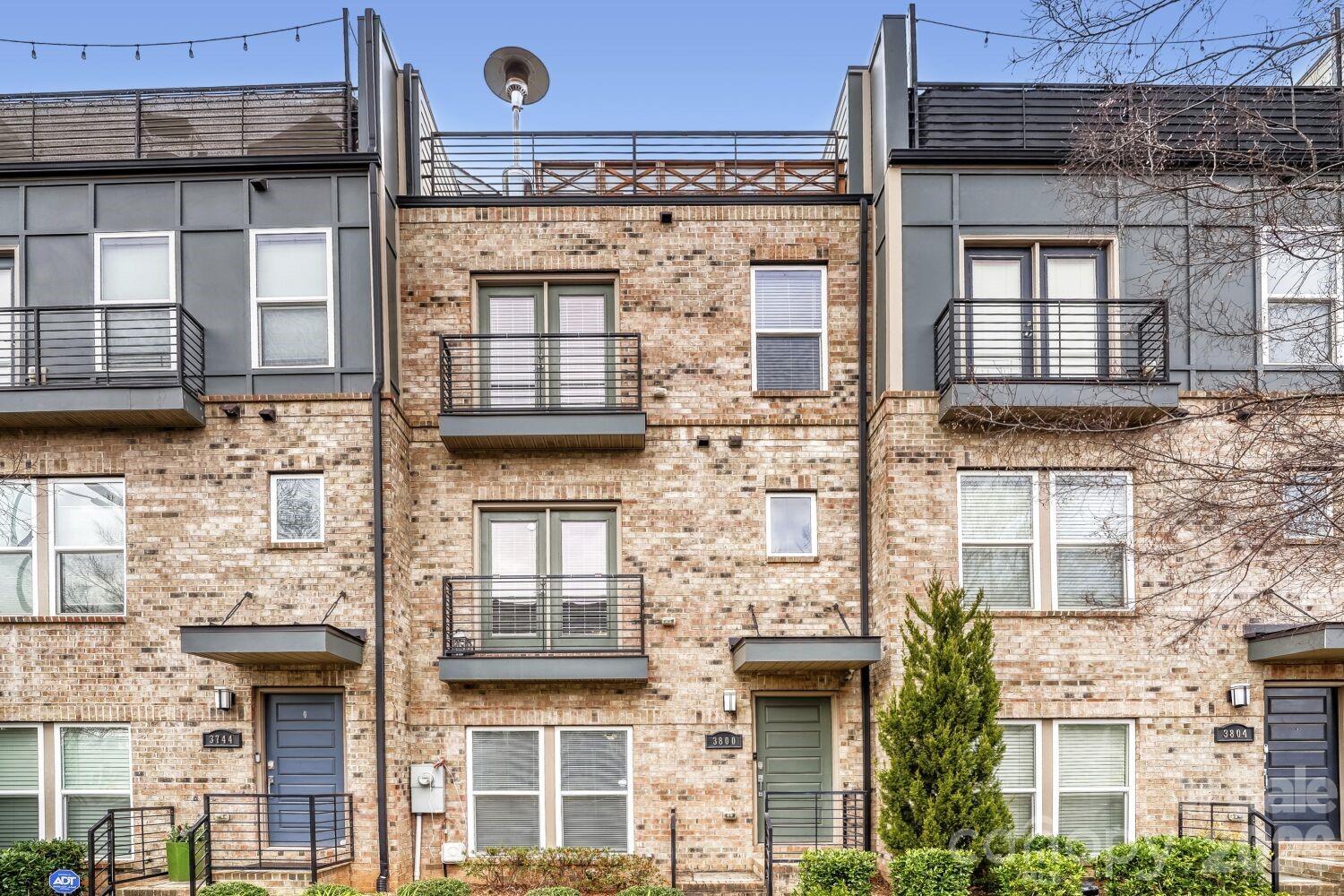Fantastic Four Story Townhome in the heart of Lower SouthEnd. Combine the security of the gated South Village community with the convenience of a walk out front door step directly onto the rail trail. Immaculately maintained home with seamless floorplan and upgrades. Rooftop Terrace with city views as well as a walk out porch and juliette balcony for seamless indoor/outdoor living and entertaining. Two car tandem garage with ample storage. Conveniently located to all things Lo-So!