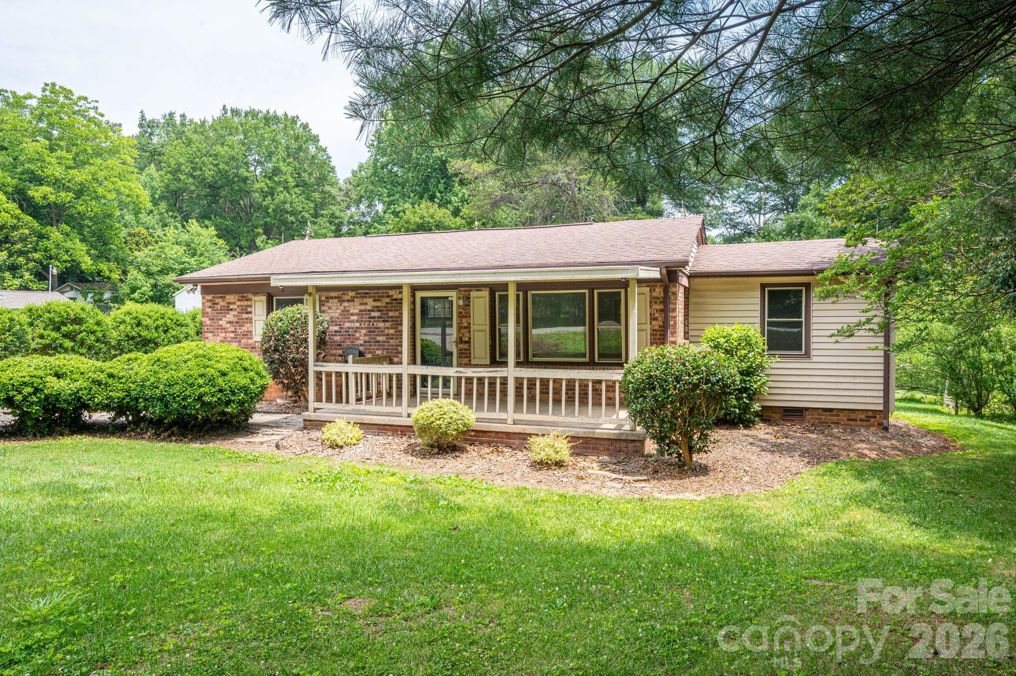 COUNTRY LIVING AT ITS FINEST! Welcome home to this beautifully remodeled ranch situated on nearly half an acre, offering the perfect blend of modern updates and peaceful country living. Opportunities like this are becoming increasingly rare, making this property a must-see for first-time homebuyers, downsizers, and anyone seeking a move-in-ready home with room to breathe.

From the moment you arrive, you’ll appreciate the charming covered front porch, spacious driveway, and classic full-brick exterior that provide both curb appeal and lasting durability. Step inside to discover a bright and inviting floor plan where every square foot has been thoughtfully designed for comfortable living. The spacious living room serves as the heart of the home and offers plenty of room for gathering with family and friends.

The entire interior has been freshly painted and enhanced with beautiful new luxury vinyl plank flooring throughout. The stunning kitchen is sure to impress, featuring elegant cabinetry, gorgeous quartz countertops, and a stylish tile backsplash that creates the perfect space for cooking and entertaining.

The completely updated bathroom boasts a new vanity, shower, toilet, and mirror, providing a clean and modern feel. Both bedrooms are generously sized and can easily accommodate a variety of bedroom furniture arrangements.

Outside, you’ll find a well-maintained backyard complete with a storage building that’s ideal for housing tools, lawn equipment, holiday decorations, and more. Additional improvements include all-new plumbing and numerous upgrades throughout the home, offering peace of mind and exceptional value.

Purchase with confidence knowing this home has been thoughtfully renovated and meticulously maintained, allowing you to enjoy worry-free homeownership for years to come.