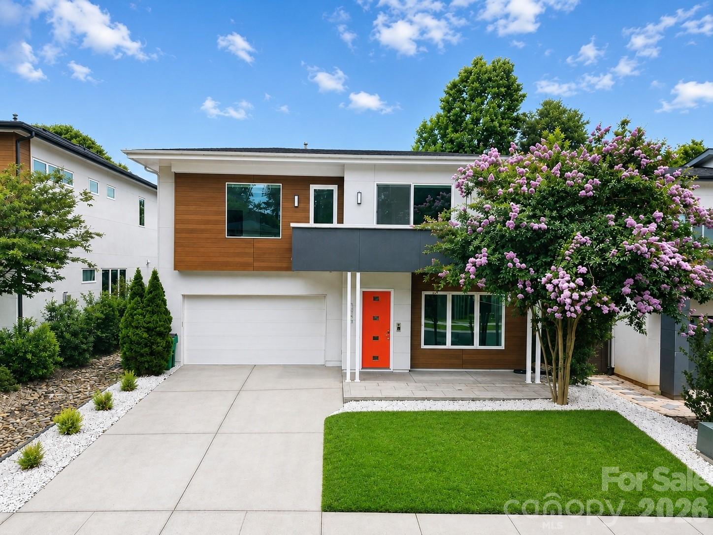 Contemporary style, energy efficiency, and an exceptional south Charlotte location define this beautifully designed home in one of the area's premier solar-powered communities. Offering nearly 3,000 square feet of thoughtfully planned living space, this residence blends modern architecture with everyday functionality. Inside, you'll find an open and inviting floor plan filled with natural light, soaring ceilings, and sleek finishes throughout. The gourmet kitchen serves as the heart of the home, featuring gorgeous cabinetry, stainless steel appliances, a large center island, generous storage, and seamless flow into the living and dining areas, making it ideal for both everyday living and entertaining. Upstairs, a spacious loft or media room provides flexible living space perfect for a home office, movie nights, playroom, or workout area. The impressive primary suite offers a spa-like retreat with dual vanities, an oversized frameless glass shower, and a large walk-in closet. Two additional bedrooms and a full bath complete the upper level. Designed with sustainability and convenience in mind, the home features solar panels, a tankless water heater, energy-efficient construction, and smart modern touches throughout. The finished two-car garage with high ceilings provides excellent storage and functionality. Located within a unique community known for its innovative design and environmentally conscious lifestyle, residents enjoy a peaceful neighborhood setting while remaining just minutes from shopping, dining, major commuter routes, and all that Charlotte has to offer. This is modern living at its finest, combining style, comfort, and efficiency in one remarkable package.