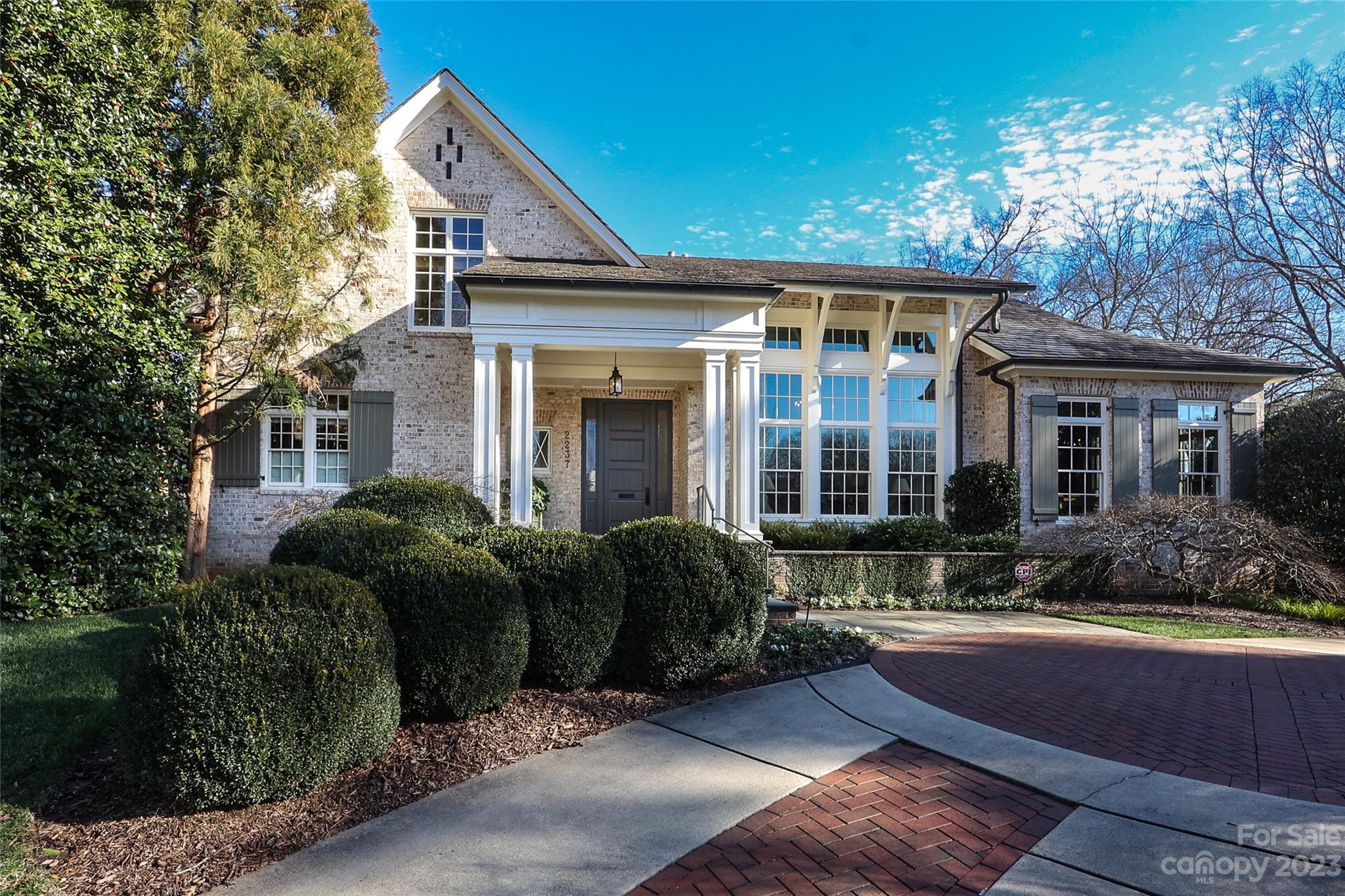 Nestled on .62 acres in the heart of Myers Park, this private, luxurious custom home has the details buyers are looking for: open floor plan, primary suite on the main and multiple living areas up, down and outside! Chef's kitchen, gracious living room, comfortable family room, and a formal dining room round out the main floor in this exceptional property. Enjoy outdoor spaces with heated saltwater pool, spa, cabana, and outdoor shower.  Snuggle by the wood burning fireplace on the covered patio, stroll through the rose garden and easily entertain family and friends on the beautiful lawn in between. Bonus Room provides great workout space - TRX included.  With an elevator, thoughtful details throughout (like copper capped shutters and gates) and a highly livable floor plan, this home effortlessly combines elegance with comfort and style. Private, professionally landscaped rear lot and gated entry for security. Slate roof. It's truly a delight to see and show.