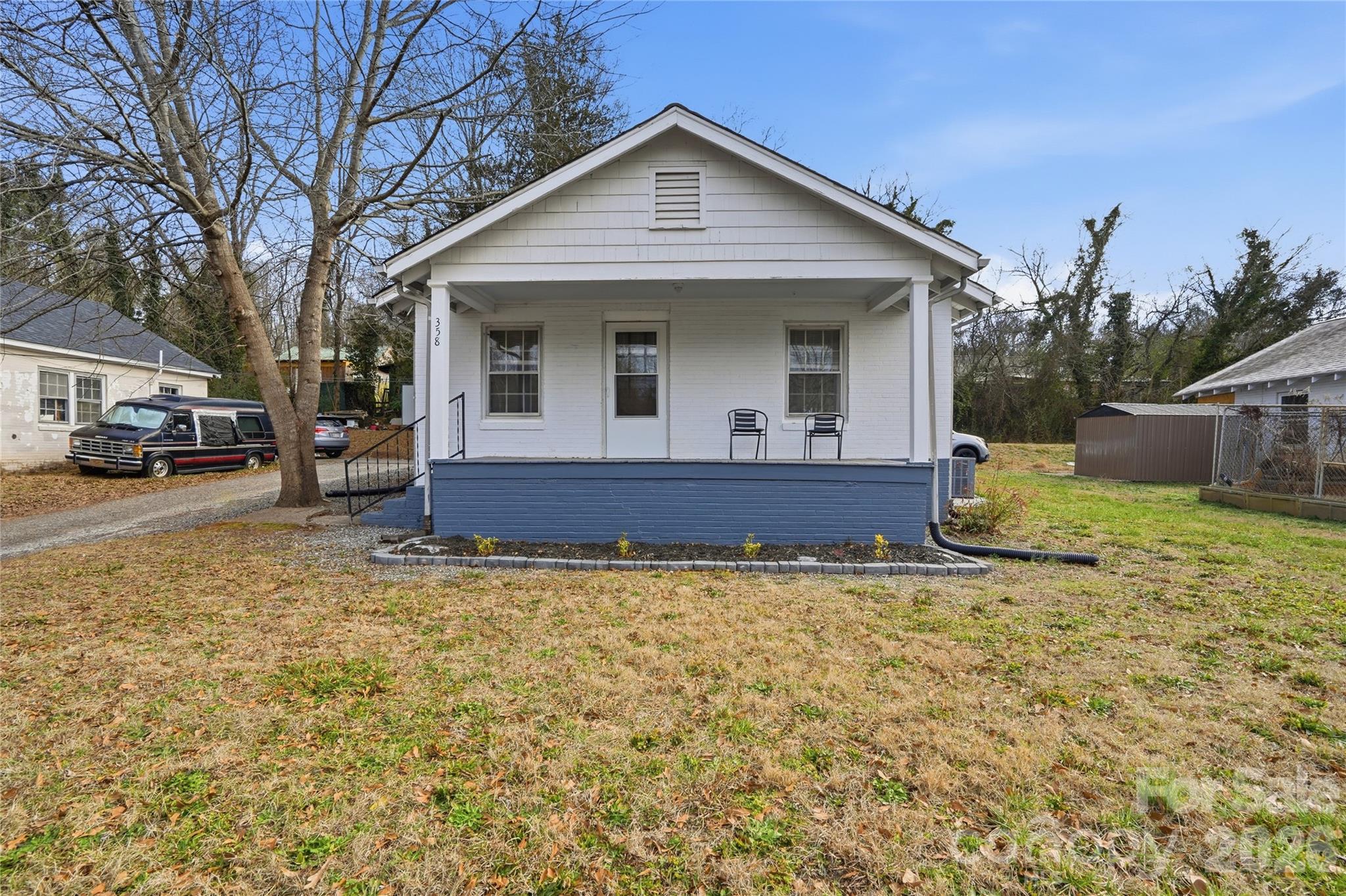 Sitting just a few city blocks from Main Street Rutherforton and Kiwanis Park I give you 358 N Cleghorn Street, this nearly 900 SqFt home has been taken very well care of and is ready for an new chapter in its story, this brick home offers one-story living with two generously sized bedrooms and spacious bathroom. The home features freshly painted walls, newly stained hardwoods in the living room and bedrooms, with linoleum in the dining room and kitchen. The kitchen has a brand new refrigerator. The laundry room is located in the rear of the home and is equipped with washer/dryer hookups. The outbuilding located at the rear of the property and is surrounded by a fence for added privacy. The oversized covered front porch is wonderful for family gatherings, cookouts or enjoying the views of town while you enjoy a morning coffee or smoke.