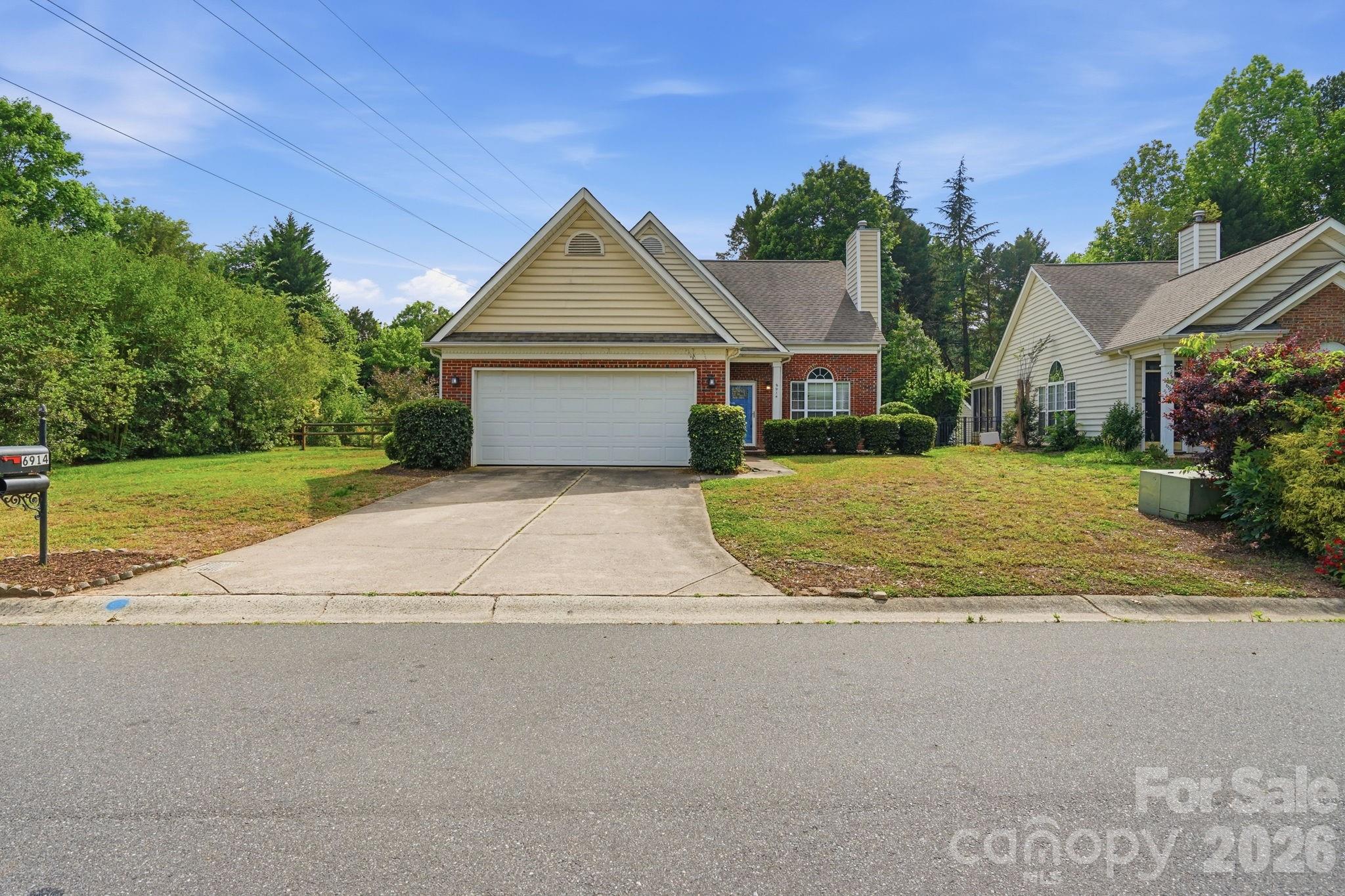 Beautiful two-story home featuring 3 bedrooms, 2.5 bathrooms, and an attached 2-car garage with a spacious and functional layout designed for comfortable everyday living. The inviting living room features a cozy fireplace, creating a warm and welcoming atmosphere for relaxing or entertaining. The kitchen offers ample cabinet and counter space and flows seamlessly into the main living areas. The primary suite includes a private bathroom with double vanity sinks and a spacious closet, providing a comfortable retreat. Additional bedrooms offer flexibility for guests, a home office, or hobbies. One or more photo(s) was virtually staged.