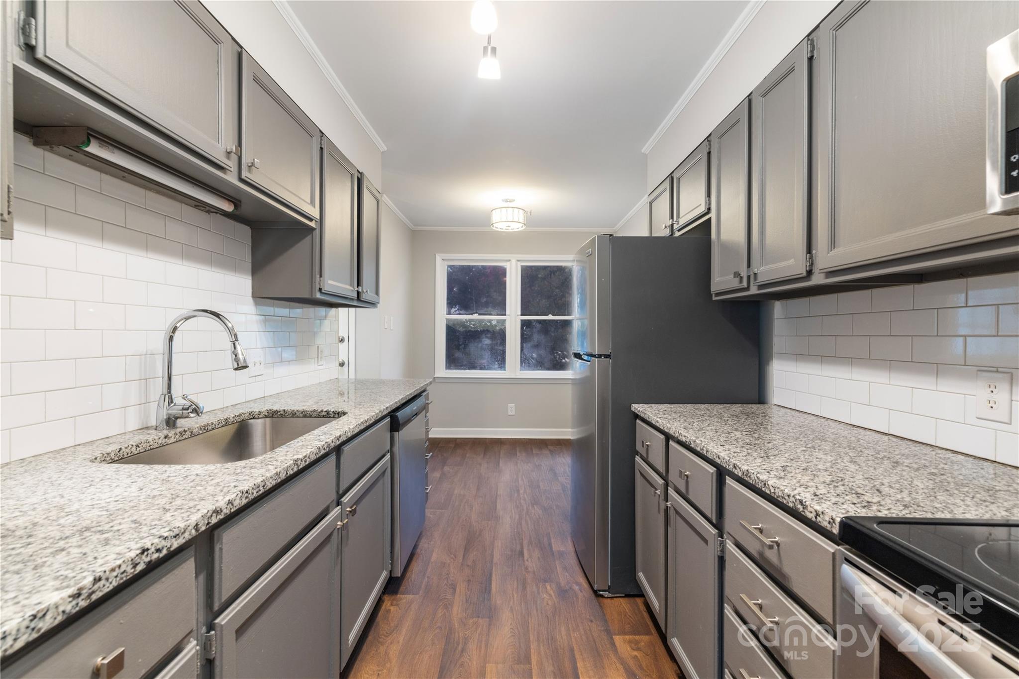 Welcome to this beautifully updated 3-bedroom, 2-bath condo located just minutes from shopping, dining, and Winthrop University. This inviting home features a completely renovated kitchen with sleek granite countertops, a modern tile backsplash, and stainless steel appliances that elevate the space.

Luxury vinyl plank flooring flows throughout the main level, and both bathrooms have been tastefully refreshed. The open living and dining area offers great natural light and leads to a private patio – perfect for relaxing or entertaining.

Ideal for homeowners or investors, this move-in ready unit combines modern touches with a prime location.