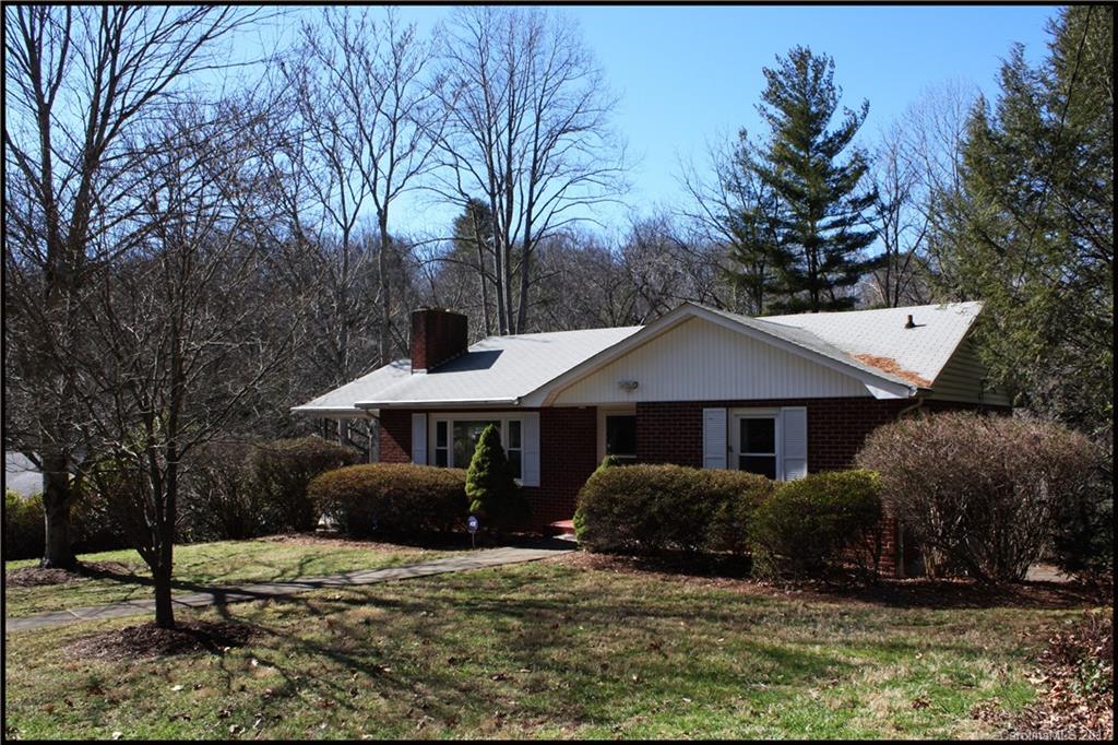 '56 Ranch in all its original grandeur. Metal cabs in kit w/ awesome over sized range & telescoping light over the eat in area of kit. It is not messed up yet & so mid century mod! Floorplan is traditional & offers formal dining w/ closet that easily satisfies 3rd bedroom on main level. Lower Den is a large party space with full bath. Killer options w/ unfinished areas of basement two single garages one at each end of house w/ endless possibilities. Lot is deep & bordered by strong creek