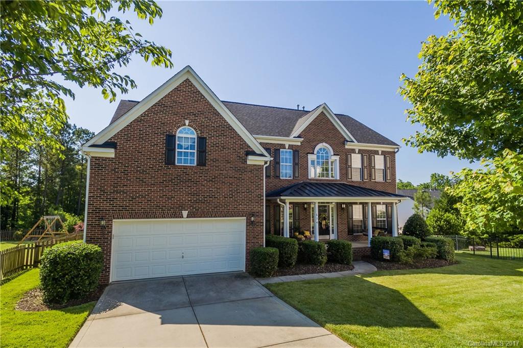 Amazing full brick home on 1/2 acre, cul-de-sac lot! Award winning Ft Mill schools. Meticulously maintained home in superb location! Gleaming hardwoods on main level with two story great room & large kitchen. Additional flex space & bath on main level. Kitchen boasts corian & oversized island! Wall of windows on back of home perfect for natural light. Upstairs is a large master with two walk-in closets & trey ceiling. Roomy bedrooms. Newly painted throughout. Great storage. In-ground irrigation.