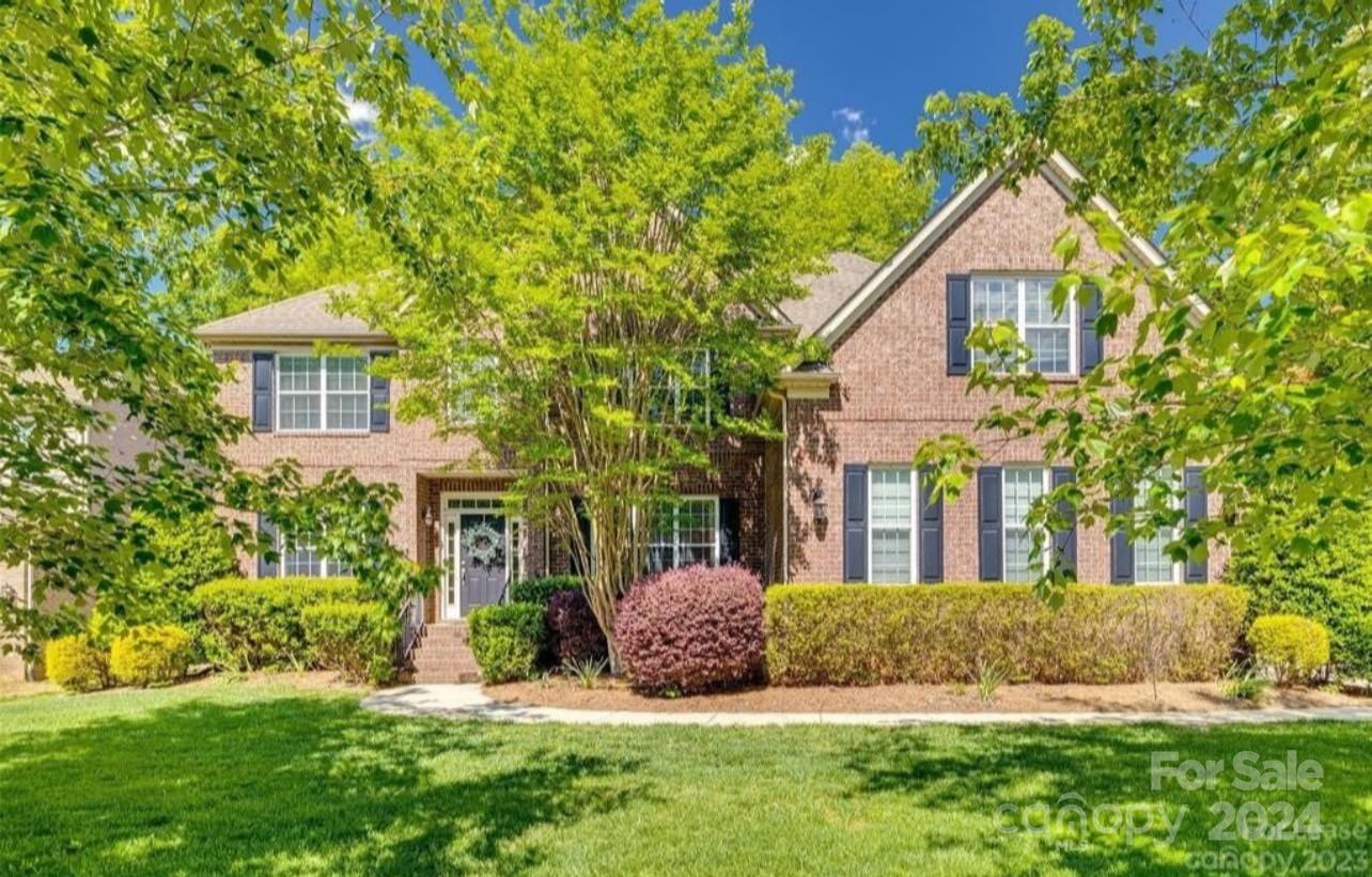Move-in ready 5 bedroom, 5 bathroom home in Stanton Heights offers luxurious living in Fort Mill. This open concept floor plan is perfect for entertaining and features a modern kitchen with granite countertops, stainless steel appliances, 2 pantries and large island. The kitchen flows seamlessly into a light-filled breakfast area and spacious living room with cozy gas fireplace. The main floor includes an office, formal dining room, guest room with full bath, butler's pantry, and custom drop zone. Upstairs the primary suite is a true retreat with a spa-like bath including a soaker tub, oversized shower, and massive walk-in closet. Room for everyone upstairs with 3 more bedrooms with attached baths, laundry room and huge bonus room. The three-car garage, private back yard, outdoor living space and access to community amenities such as a pool, clubhouse, sport courts, playgrounds and walking trails make this home a must-see. New carpet, neutral paint, designer lighting and so much more!