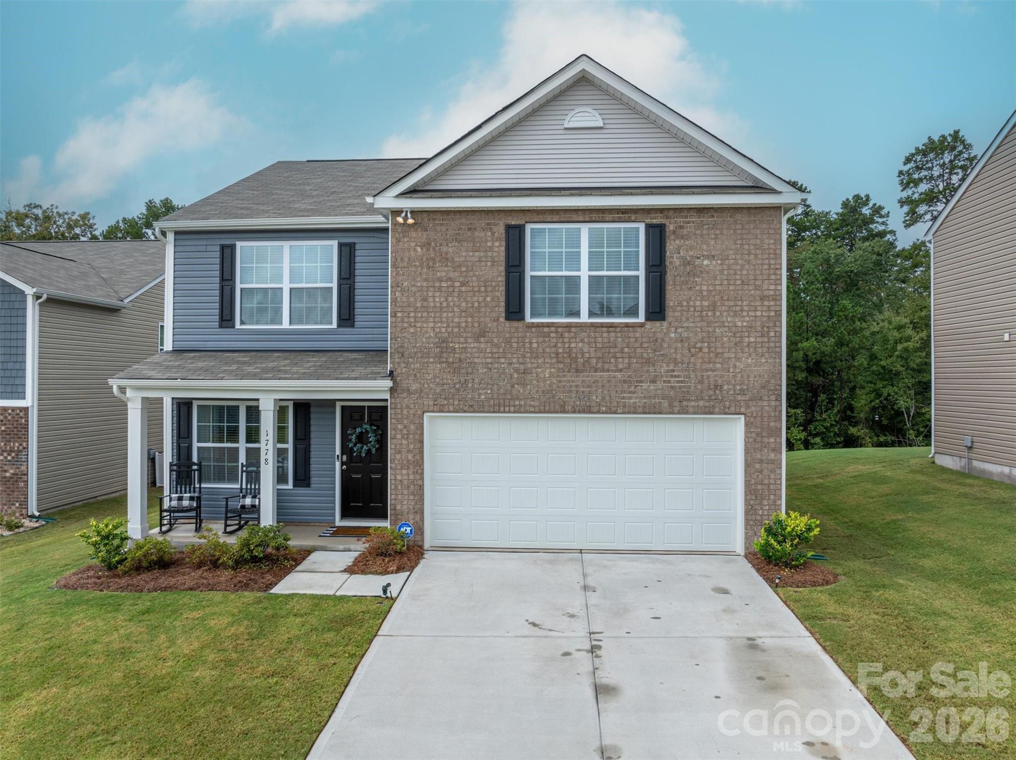 This nearly new home—less than two years old—is move-in ready and waiting for its next family. Located in a beautiful community with a clubhouse and pool, it offers both comfort and convenience. The kitchen stands out with granite countertops, a stylish backsplash, crisp white cabinets, and a spacious pantry. The family room features a cozy fireplace and flows seamlessly into the dining area, creating the perfect space for gathering. With easy access to I-85 and Hwy 321, and just a short drive to Charlotte Douglas Airport, this home combines modern living with an unbeatable location.