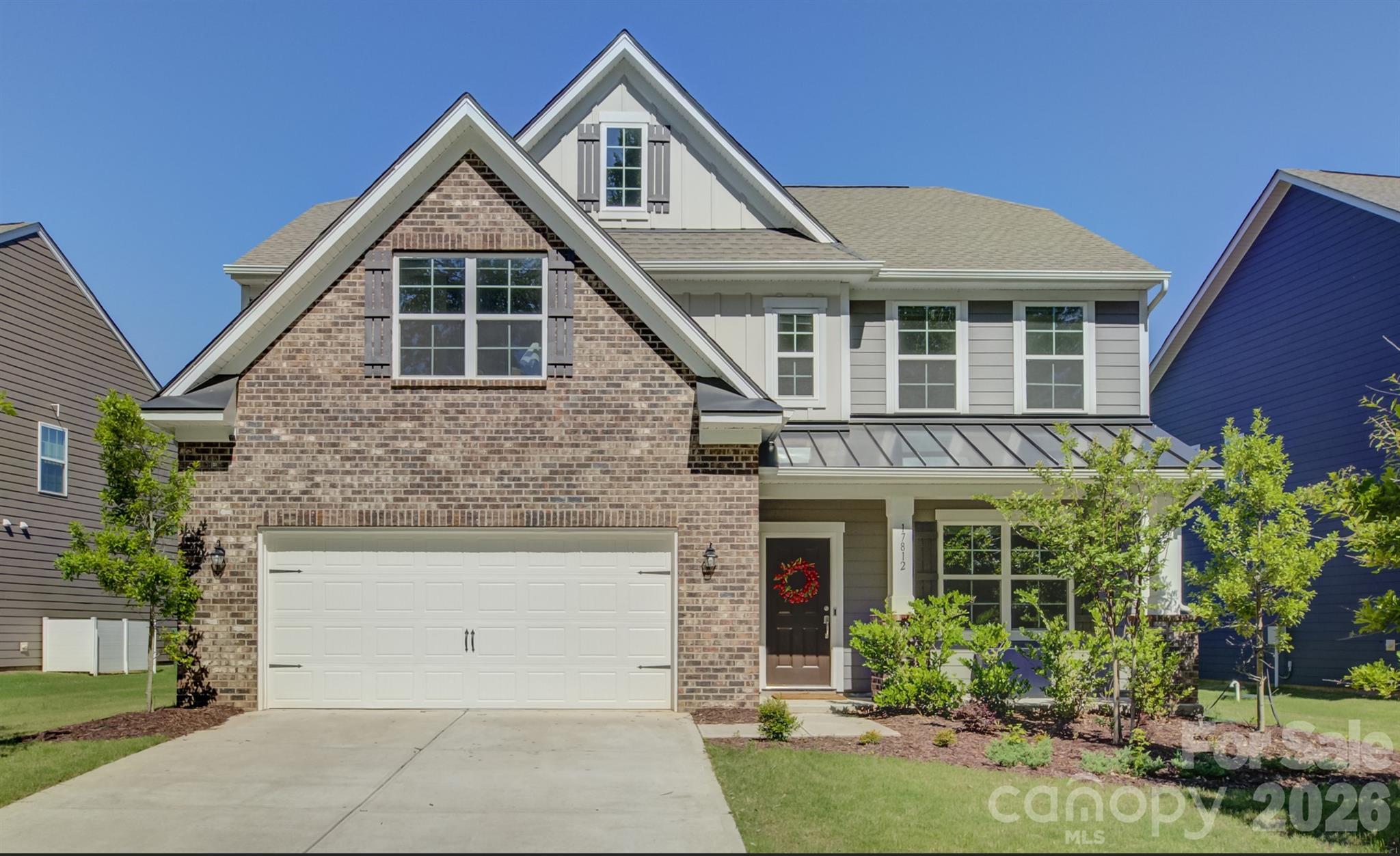 Located in the highly desirable, amenity-rich Palisades community, this beautifully designed home blends comfort, style, and everyday convenience. A charming rocking-chair front porch welcomes you inside, where a private office with French doors creates the ideal work-from-home space. The formal dining room features elegant wainscoting and an arched entry, offering a refined setting for entertaining.
The sunlit great room, centered around a cozy gas fireplace, flows seamlessly into the gourmet kitchen with white cabinetry, a gas range, a center island, and an oversized walk-in pantry. The adjoining breakfast area opens onto a paver patio and a deep, fenced backyard—perfect for outdoor dining, play, or relaxing in a peaceful setting through sliding glass doors.
Upstairs, a spacious loft provides flexible living space for a media room, playroom, or additional lounge area. The generous primary suite is a private retreat with a dual-sink vanity, glass-enclosed shower, and an oversized walk-in closet. Three additional bedrooms, a full bath, and a conveniently located laundry room complete the upper level.
Residents of The Palisades enjoy resort-style amenities including a clubhouse, fitness center, swimming pool with waterslide, tennis and pickleball courts, basketball court, playgrounds, and miles of walking trails, along with access to The Palisades Country Club and its Jack Nicklaus–designed championship golf course. Convenient to Lake Wylie and Uptown Charlotte, The Palisades offers one of the area’s most sought-after lifestyles.