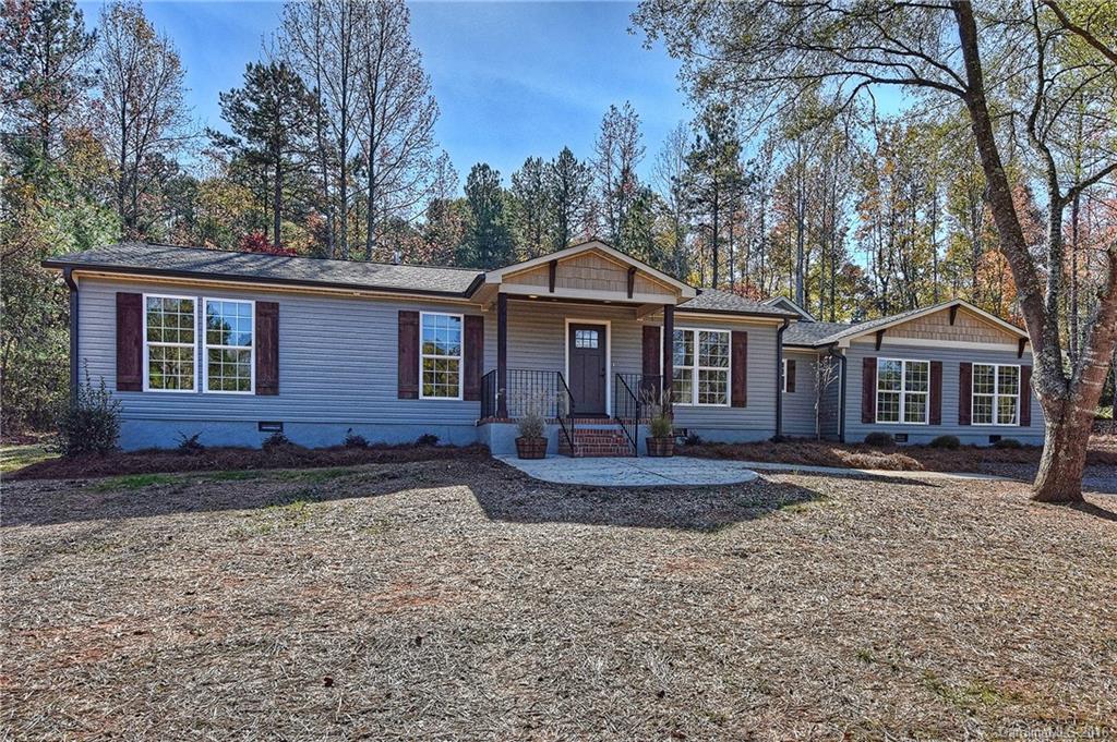 Fabulous hard to find Craftsman-styled Ranch with acreage on a cul de sac street. LOW South Carolina Taxes & accessibility to Ballantyne/Highways & entertainment. COMPLETELY renovated:NEW kitchen w/granite, Island & SS Appliances. HUGE open Great Room w/FirePlace & Hardwood floors!  Three Bdrms, +Bonus Room/4th Bdrm, 3 NEW tile baths, NEW flooring, NEW roof, NEW HVAC...Wooded 1.77 acre lot with trees, enjoy nature on private back deck/Fire pit too!  Detached-oversized 2-car garage!  A rare find!