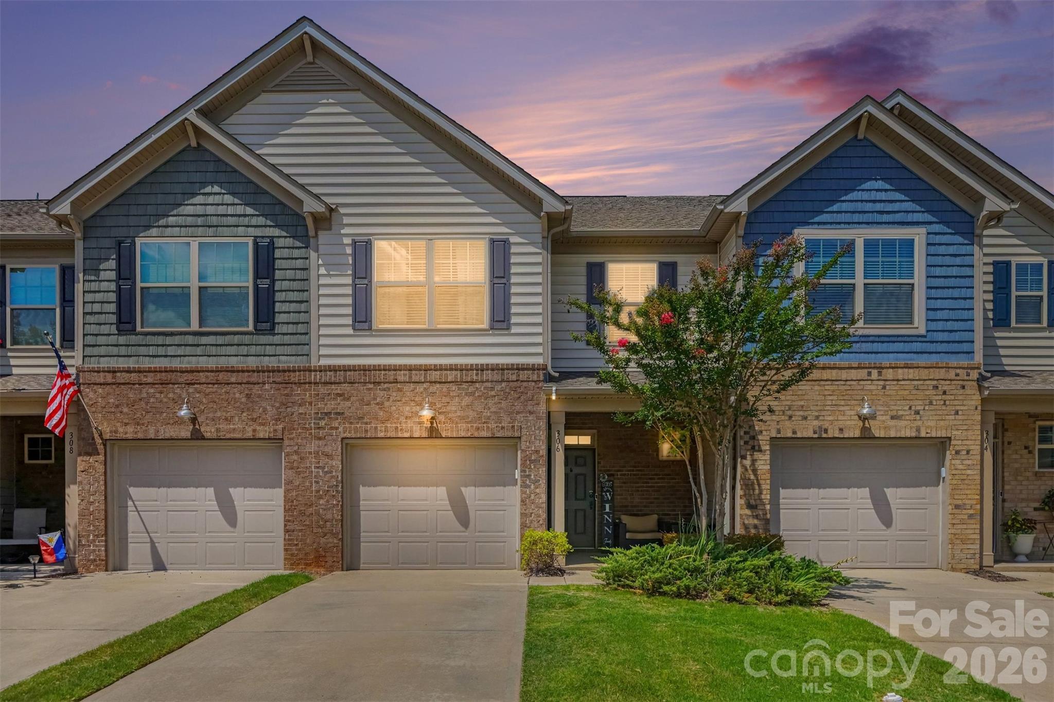 Rare opportunity to own a townhome with a wooded backyard, private screened-in porch, and a pocket park right outside your front door! Beautifully maintained and ideally located in the sought-after Waterside at the Catawba community, this home offers the perfect balance of privacy, convenience, and resort-style living.

Inside, you'll find an open dining area and a spacious living room centered around a cozy fireplace. The bright kitchen features white cabinetry, granite countertops, stainless steel appliances, and opens seamlessly to the screened-in porch overlooking the peaceful, tree-lined backyard.

Upstairs, the spacious primary suite features a tray ceiling, customized walk-in closet, and a spa-inspired bath with dual vanities, a soaking tub, and a tiled walk-in shower. Two additional bedrooms, a shared full bath, and a generously sized laundry room complete the upper level. Additional highlights include a drop zone and an epoxy-finished one-car garage.

Enjoy Waterside at the Catawba's exceptional amenities, including a resort-style pool, clubhouse, walking trails, paddleboard launch on the Catawba River, Banks Athletic Park, and award-winning Fort Mill schools.