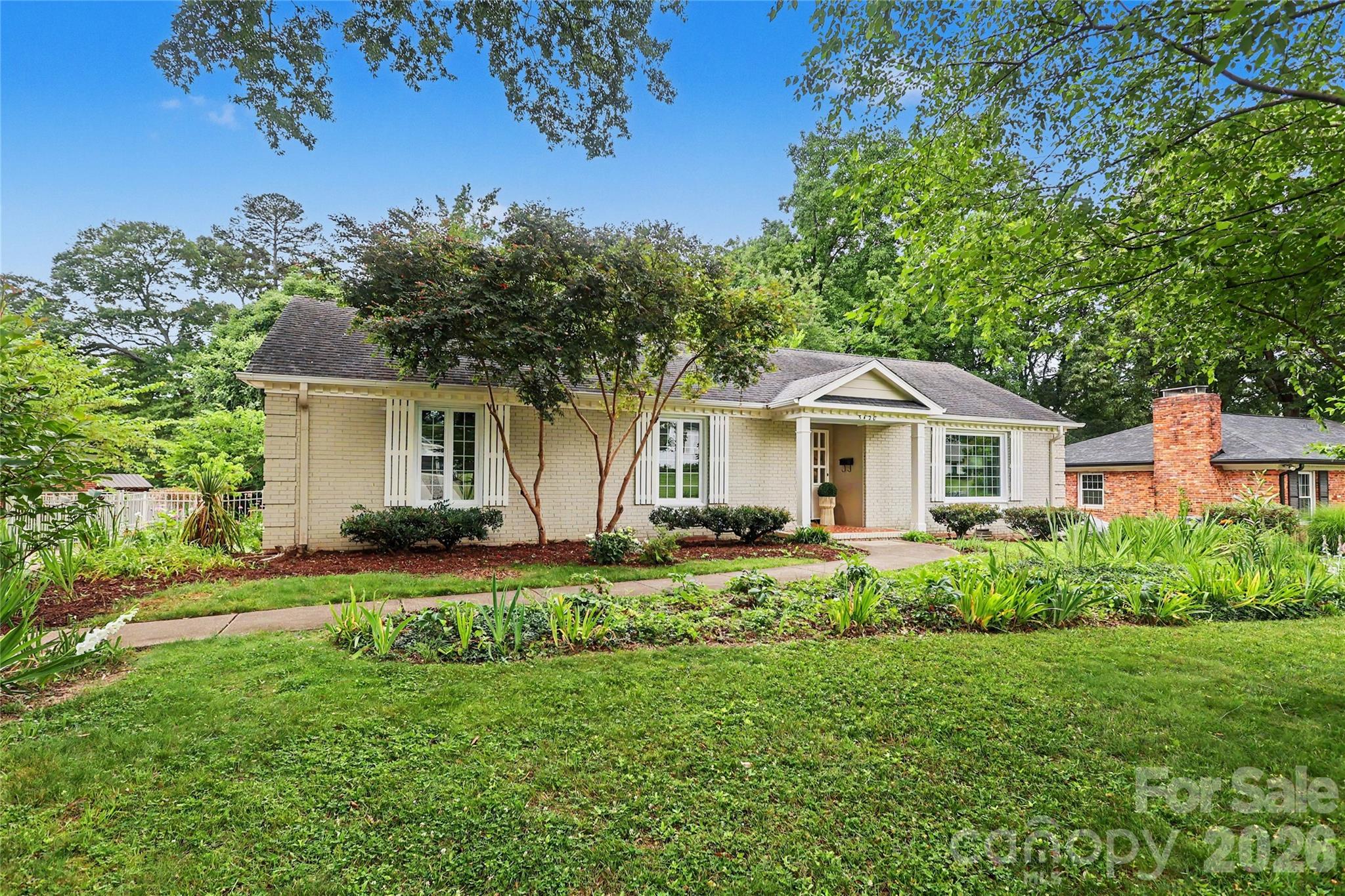 Poised for the perfect opportunity & vision. This charming ranch style home is situated on a great lot and a highly desired street. Quintessential curb appeal with flowering garden give a quaint cottage feel. Welcoming entry hallway flows into formal living & dining rooms which are generously proportioned. Well maintained hardwoods throughout. Gorgeous windows providing abundant natural light. Open kitchen and family room areas make for intimate gathering & entertaining spaces. Separate flex area off of the back of  home with versatile potential as either an office or playroom area. Good sized bedrooms with a designated primary suite.  Huge deck & private back yard.  Covered parking and storage shed are an added convenience for this property.  Short proximity to the Greenway, Southpark Mall, Symphony Park and some of the area's best dining & shopping spots. Walkable to Selwyn, AG & Myers Park campuses.  Easy access to Uptown & the airport. Convenient to Barclay Downs Swim & Racquet Club. (requires membership).  
Don't miss this incredible opportunity to be in one of Charlotte's most coveted & ideally located neighborhoods.