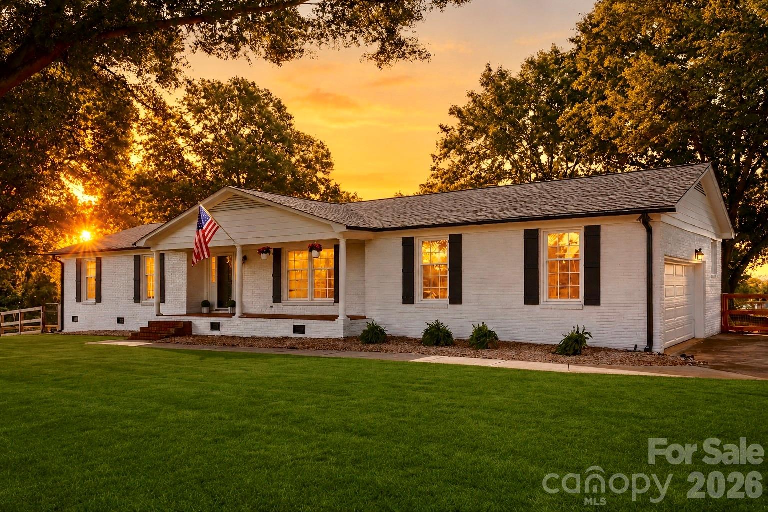 Welcome to 10858 Barberville Rd, a beautifully maintained brick ranch offering the perfect blend of quiet country living and unbeatable convenience. This 3-bedroom, 2-bath home sits on over an acre, surrounded by mature trees and a fenced in backyard. Step inside to find a well-cared-for interior designed for comfortable everyday living. The functional layout offers generous living spaces, while large windows bring in abundant natural light. A two-car garage provides ample storage and convenience. This home has been meticulously maintained —including an encapsulated crawlspace and a new roof installed in 2025. Enjoy the benefits of lower Lancaster County taxes while being less than a mile from the vibrant Ballantyne area, where shopping, dining, and entertainment options are right at your fingertips. With easy access to Indian Land and Charlotte, this location is ideal for commuters or anyone seeking proximity to city amenities without sacrificing space and tranquility. Don’t miss this opportunity to own a move-in-ready home in a prime location with the best of both worlds.