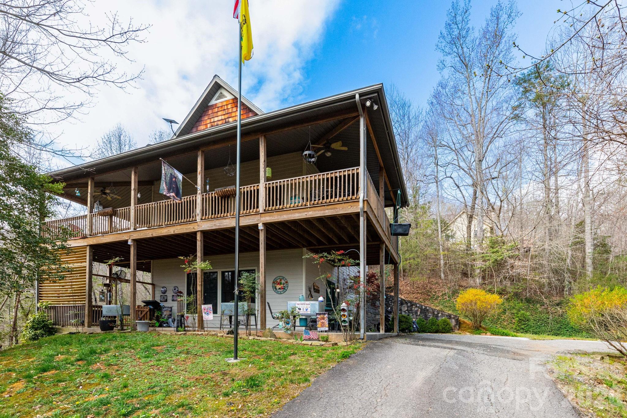 Tucked away on a private 1+ acre lot in the beautiful mountains of Western North Carolina, this spacious 3 bedroom,3.5 bath home offers the perfect blend of comfort, flexibility, and natural surroundings. The main level features a warm and inviting living area filled with natural light, a functional kitchen with island and breakfast bar, and a layout ideal for both everyday living and entertaining.

The lower level provides additional living space perfect for a game room, guest suite, or potential in-law quarters offering versatility for multi-generational living, rental potential, or hosting visitors.

Step outside and enjoy the peaceful setting surrounded by mature trees and mountain air. Whether you're looking for a primary residence, second home, or investment opportunity, this property delivers privacy while still being conveniently located near Sylva’s shops, dining, and outdoor recreation.

Experience mountain living with space to relax, entertain, and make it your own.