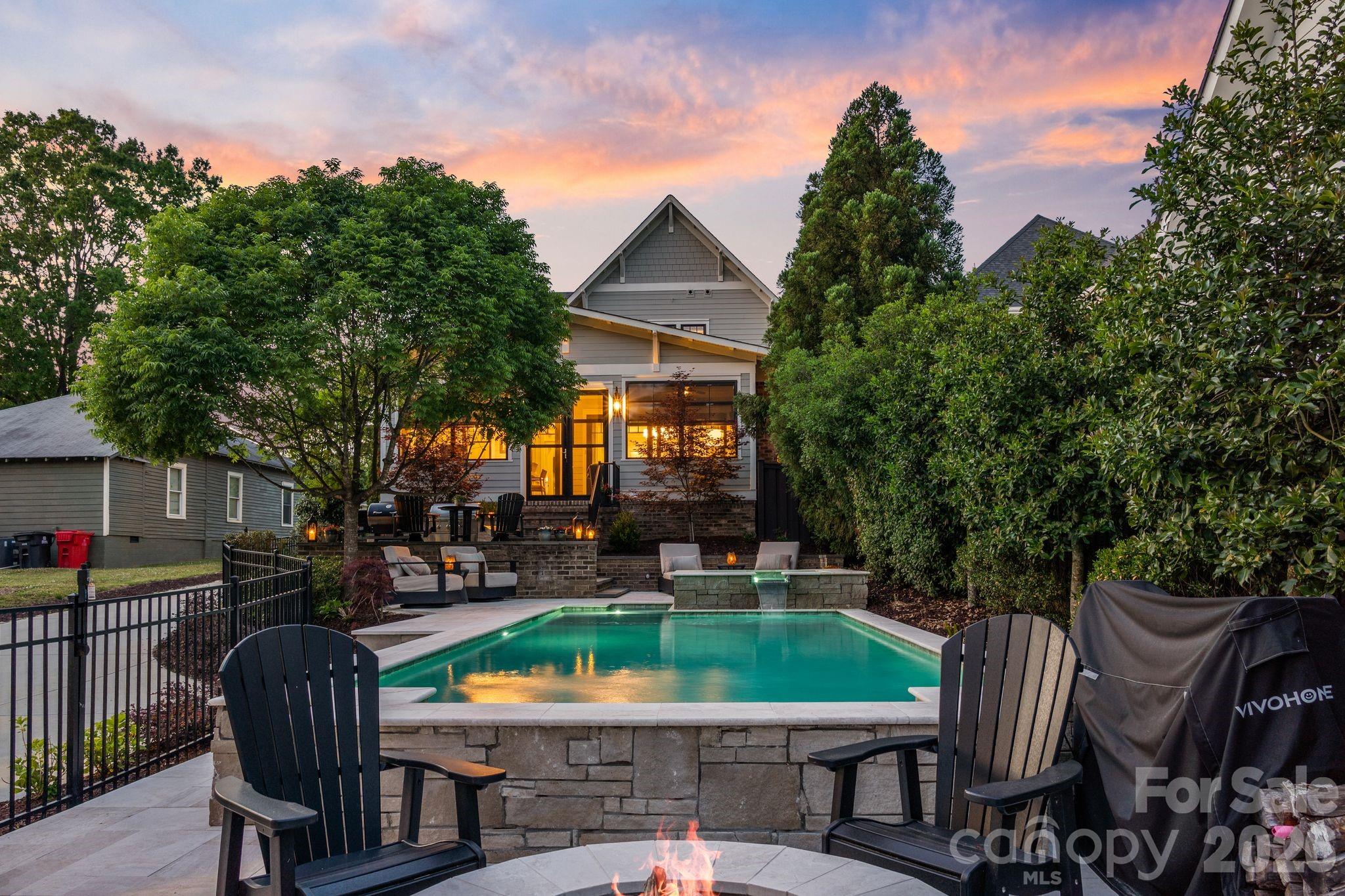 Life in Davidson just got even sweeter. Perfectly positioned in one of the town’s most coveted locations, this exceptional custom home delivers a rare blend of refined luxury, everyday comfort, and effortless walkability—just moments from the vibrant charm of downtown Davidson and its beloved Main Street.
Built by  John Marshall Custom Homes, this meticulously maintained residence spans over 3,400 square feet of thoughtfully curated living space, where timeless design meets modern sophistication. Every inch of this home has been impeccably cared for, offering a true sense of pride in ownership and move-in-ready ease. From the moment you step inside, you’re welcomed by a fresh, neutral palette and elevated designer finishes that create a sense of understated elegance throughout.
The main-level primary suite offers both privacy and convenience with a walk in custom closet.  Newly updated primary bath with georgous tile, and vanity selections. The open flowing floorplan is perfectly designed for seamless daily living and memorable entertaining. At the heart of the home, the chef’s kitchen makes a striking impression—anchored by a dramatic marble island and outfitted with premium Thermador appliances, crisp white cabinetry, and a stylish beverage station that is perfect for hosting.
Step outside, and the experience only gets better. The backyard is a true oasis and private retreat, thoughtfully designed for year-round enjoyment. Relax on the all seasons porch, unwind beside the sparkling saltwater pool and spa, or gather around the firepit—all within a beautifully fenced setting that feels both intimate and expansive.
Adding remarkable flexibility, the detached garage features a fully conditioned gym space ( 260 additional sq ft) along with a beautifully finished private apartment complete with its own kitchen, bedroom, and full bath—ideal for hosting guests, accommodating extended family, or providing an independent living space for a college student.
And then there’s the lifestyle. Imagine strolling to the heart of Davidson to enjoy live music on the green, catching a game at Davidson College, or dining at some of the area’s most celebrated restaurants. Located one mile to Lake Norman and boat access- This is more than a home—it’s an elevated way of living in one of the region’s most loved areas.