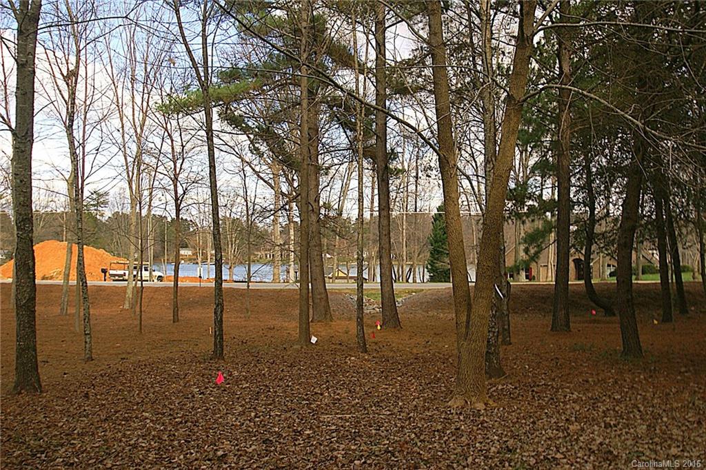 Water view Lot in the quaint gated Sconset Village section of The Point / Trump National Golf Course.  No time limit to build, the builder must be approved by Crescent Resources. Marketing fee is required to be paid to Crescent at closing on new builds.  Septic perks for 4 bedroom home.
