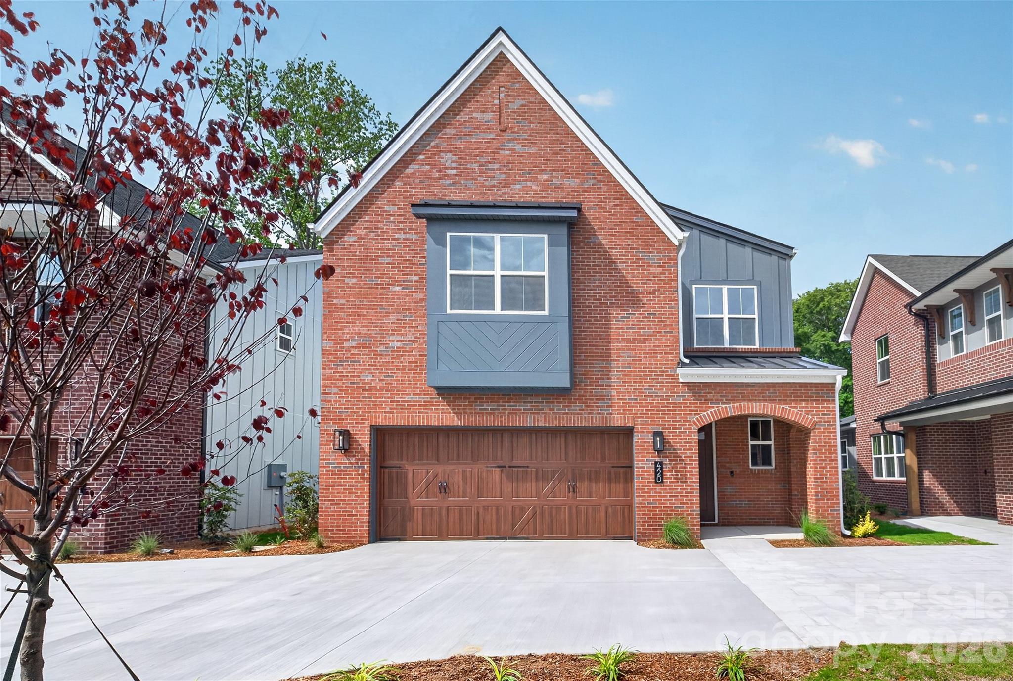 Lucere at Windell Woods is a unique, carriage home community for homeowners looking for an intimate courtyard living experience. This community features three different thoughtful home designs to choose from, with a transitional approach that fosters a sense of community. Each home includes landscape maintenance with your HOA dues.
Please note that while the Babbling Brook Lane is a public street, the shared driveway is considered private.