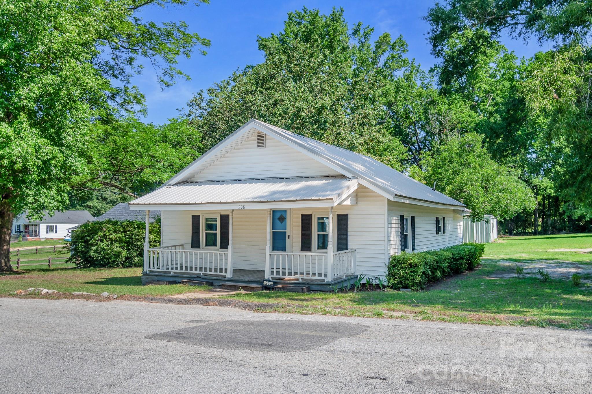 Welcome to the cutest bungalow situated on .65 acres in the quaint town of Jefferson, SC.  This adorable home has two bedrooms and one bathroom.  This home has a 2019 roof, new windows in 2023, and new flooring in 2024.  This would make an excellent home for anyone!!  OPTION TO PURCHASE THE CORNER LIGHT RIGHT BESIDE IT that is listed separately (305 Hartman Circle, Jefferson SC) that's an additional .61 acres.  Don't let this one pass you by!