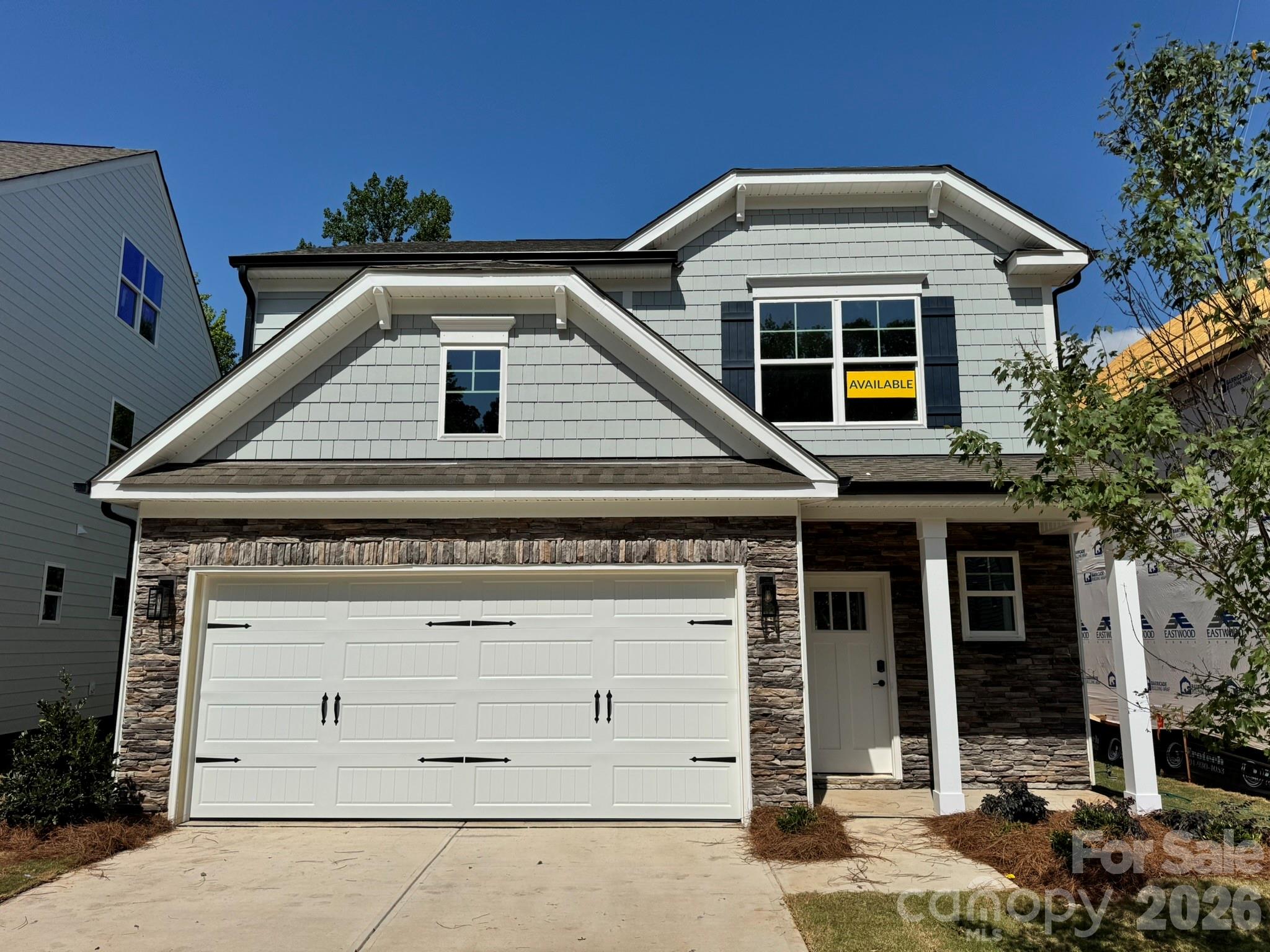 New boutique community in Charlotte near the University area with easy access to dining, retail, and interstates. This 2-story Ellerbe plan offers 3 bedrooms, 2.5 baths and almost 1,900 square feet of living space. The main living area features the family room with a Cosmo, direct-vent, gas fireplace, breakfast area that walks out to a covered porch, and a designer kitchen. The kitchen has white cabinets, quartz counters, tile backsplash, and stainless appliances including a range hood & gas cooktop. Lower cabinets, quartz counters, and backsplash extend into the breakfast area to create extra storage and a buffet for entertaining. The upper floor features the primary suite, two secondary bedrooms, a hall bath with tub/shower combo, loft, and the laundry space. Visit today and find out more about this exciting new community!