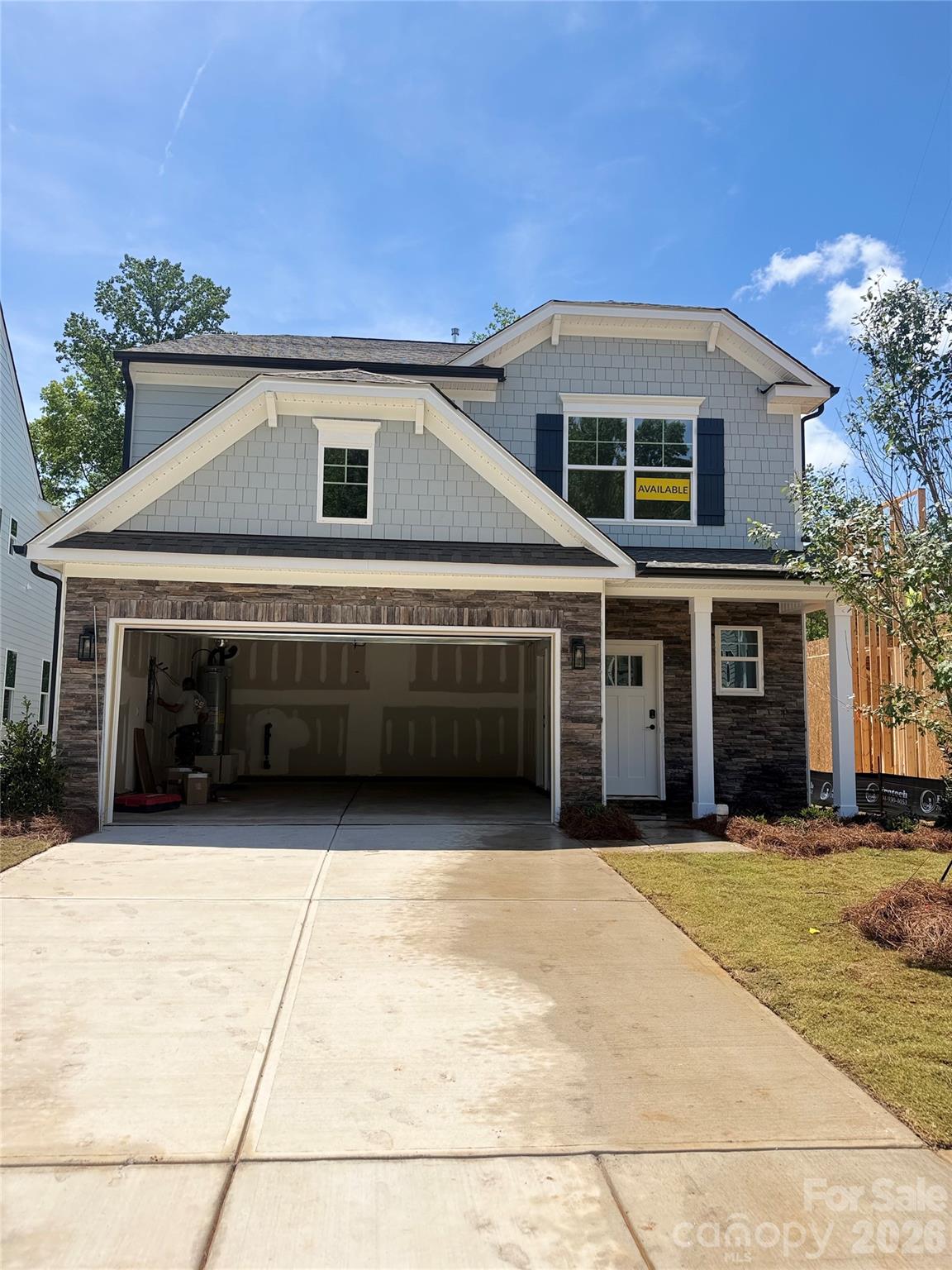 New boutique community in Charlotte near the University area with easy access to dining, retail, and interstates. This 2-story Ellerbe plan offers 3 bedrooms, 2.5 baths and almost 1,900 square feet of living space. The main living area features the family room with a Cosmo, direct-vent, gas fireplace, breakfast area that walks out to a covered porch, and a designer kitchen. The kitchen has white cabinets, quartz counters, tile backsplash, and stainless appliances including a range hood & gas cooktop. Lower cabinets, quartz counters, and backsplash extend into the breakfast area to create extra storage and a buffet for entertaining. The upper floor features the primary suite, two secondary bedrooms, a hall bath with tub/shower combo, loft, and the laundry space. Visit today and find out more about this exciting new community!