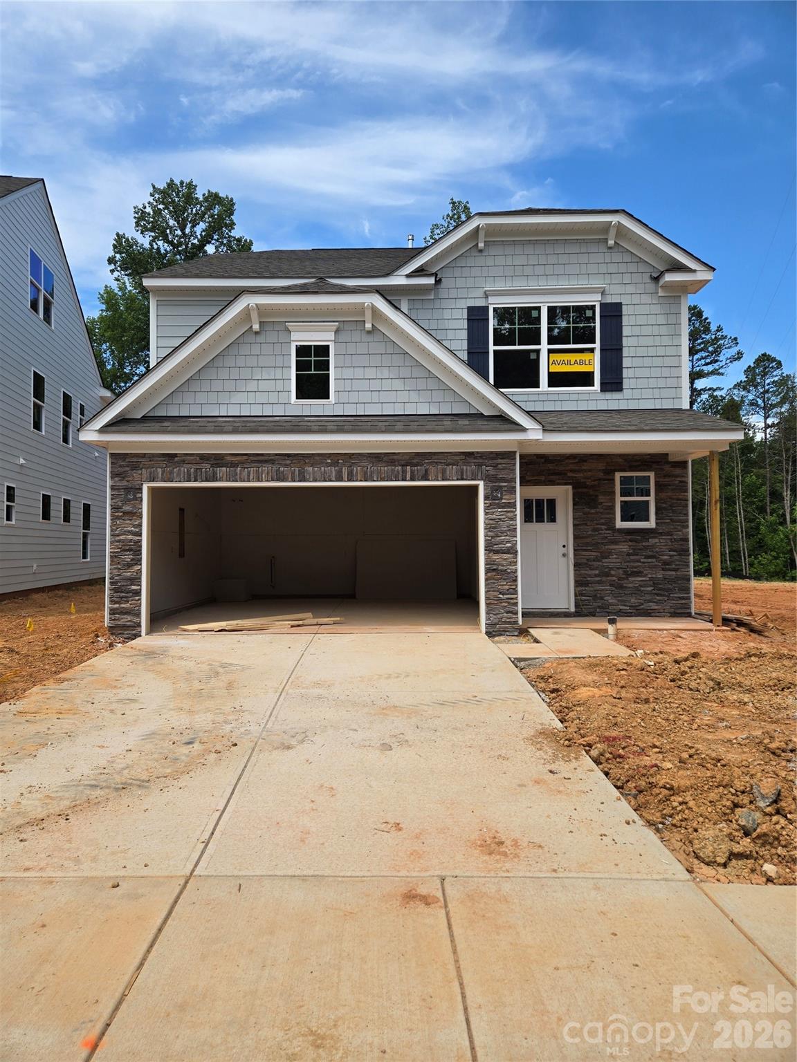 New boutique community in Charlotte near the University area with easy access to dining, retail, and interstates. This 2-story Ellerbe plan offers 3 bedrooms, 2.5 baths and almost 1,900 square feet of living space. The main living area features the family room with a Cosmo, direct-vent, gas fireplace, breakfast area that walks out to a covered porch, and a designer kitchen. The kitchen has white cabinets, quartz counters, tile backsplash, and stainless appliances including a range hood & gas cooktop. Lower cabinets, quartz counters, and backsplash extend into the breakfast area to create extra storage and a buffet for entertaining. The upper floor features the primary suite, two secondary bedrooms, a hall bath with tub/shower combo, loft, and the laundry space. Visit today and find out more about this exciting new community!