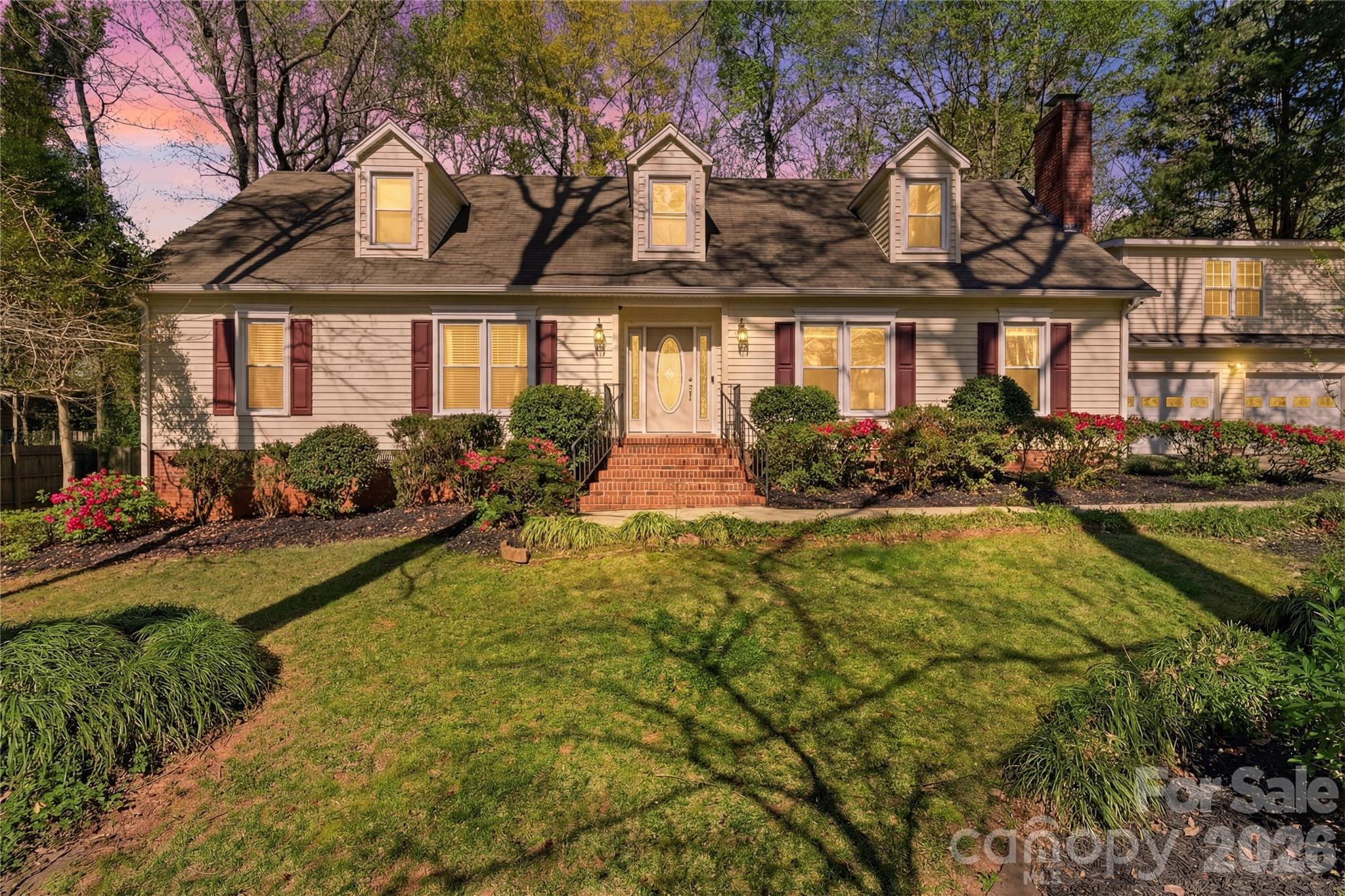 RARE FIND! Fort Mill home, voluntary HOA with Second living quarters!! Tucked away in an established Fort Mill neighborhood of Old Orchard , this home sits on a generous half-acre lot at a quiet dead end next to a non-buildable parcel, offering added privacy. Bamboo flooring runs through the main living areas, and the kitchen features stainless steel appliances, gas cooktop and granite countertops that make both everyday living and entertaining easy.

A major highlight is the fully finished suite above the detached garage, complete with a bedroom, full bathroom, plumbing in place for a kitchenette, and a separate private entrance. This space offers excellent flexibility for guests, extended family, or rental income.

Outdoor living shines with a large deck overlooking the backyard, a walking path that winds through the trees, and a spacious shed for storage or projects. Award winning Fort Mill schools, and a peaceful setting combine to create a property that offers both convenience and privacy in a well-established community!