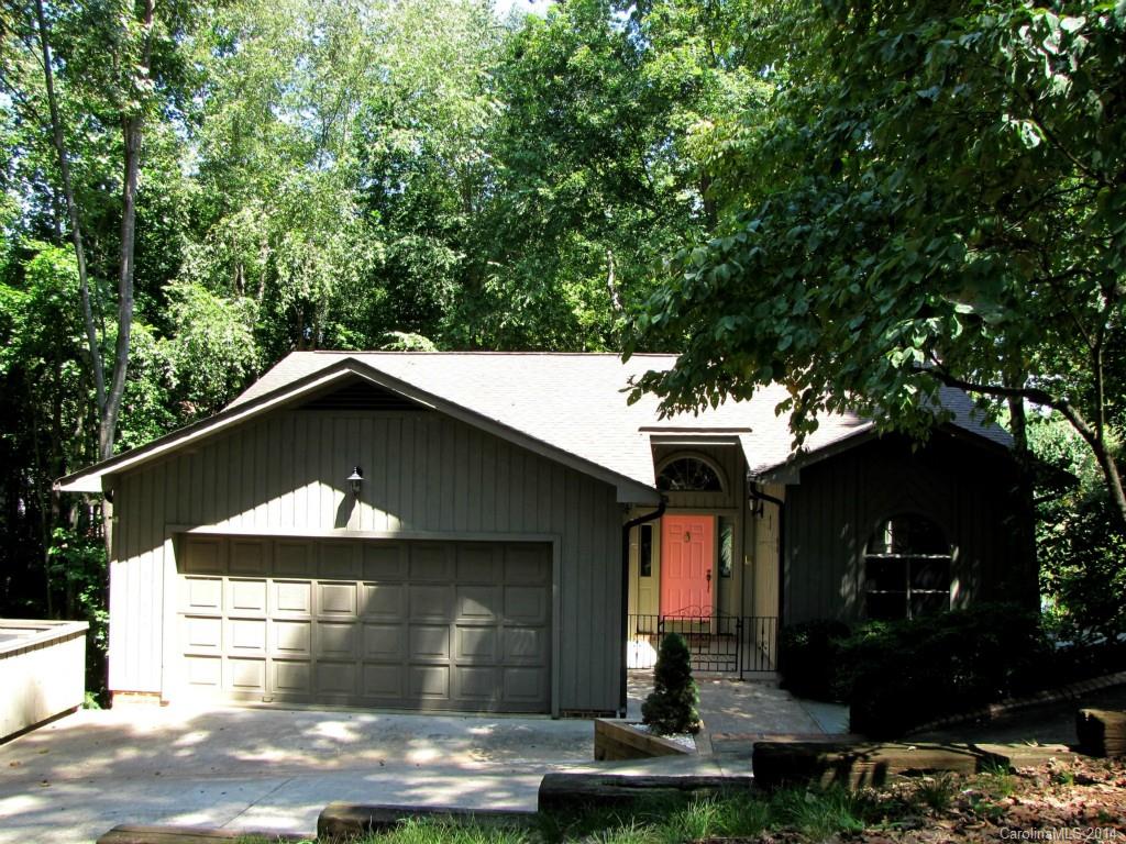 Waterfront Lake Wylie w/DOCK & water view. Well cared for 4 bedroom home w/2 wood burning fireplaces. Spacious main Master & luxury updated bath & huge closet. Open kitchen with eat at bar & lots of counter space/cabinets. Three bedrooms in lower level with 2nd Great room and open bar. Large flex room for craft/workshop. Two levels of decking overlook cove and trees. Irrigation from lake. Large DOCK.