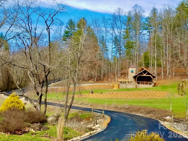 Some lots are just land. This one is a lifestyle.

Tucked into the natural beauty of Western North Carolina, this exceptional parcel sits within Mountain Meadows — a rare Green Built community where neighbors share an organic garden, gather at a stunning lodge, and wake up every morning surrounded by the kind of quiet that most people only find on vacation.

This isn't just a place to build a home. It's a place to put down roots — thoughtfully designed, sustainably built, and located just minutes from Weaverville and Asheville, with easy access to Mars Hill and Barnardsville.

Parcels like this don't last. Schedule your private showing today.