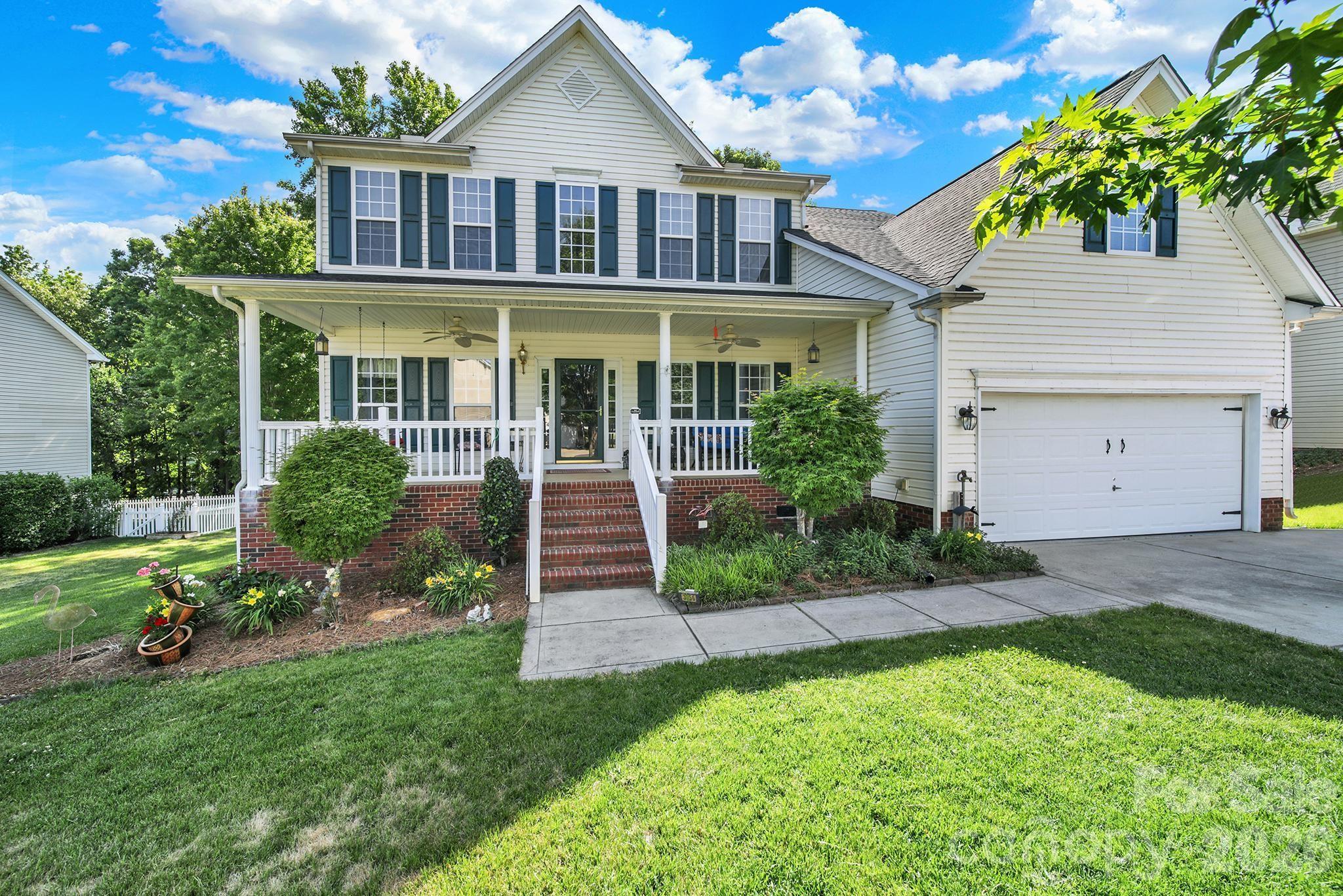 Discover this charming home, perfectly situated on a private wooded lot. Designed for both comfort and function, the open-concept floor plan is flooded with natural light and features a spacious 2-story living area, kitchen in the heart of the home with ample cabinetry and counter space. Primary bedroom is on the main level with it's own ensuite bath and two large closets. Heads upstairs to find 3 additional bedrooms and a bonus room on the upper level and dedicated office down on the main level. Step outside to enjoy your private backyard oasis—ideal for entertaining, relaxing, or simply enjoying the peaceful surroundings. Both HVAC units replaced in the last 8 years, gutter guards on rear of home, and a new roof in 2022. Located just minutes from shopping, dining, & top-rated schools, this home offers the perfect blend of it all.