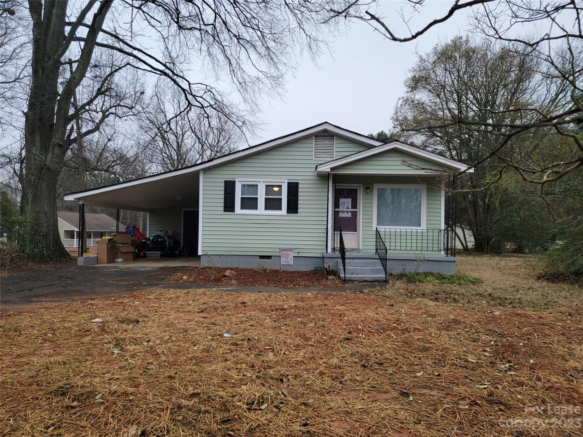 Nice updated home with carport, spacious kitchen and dining, granite countertops, laundry hook-ups, No Smoking