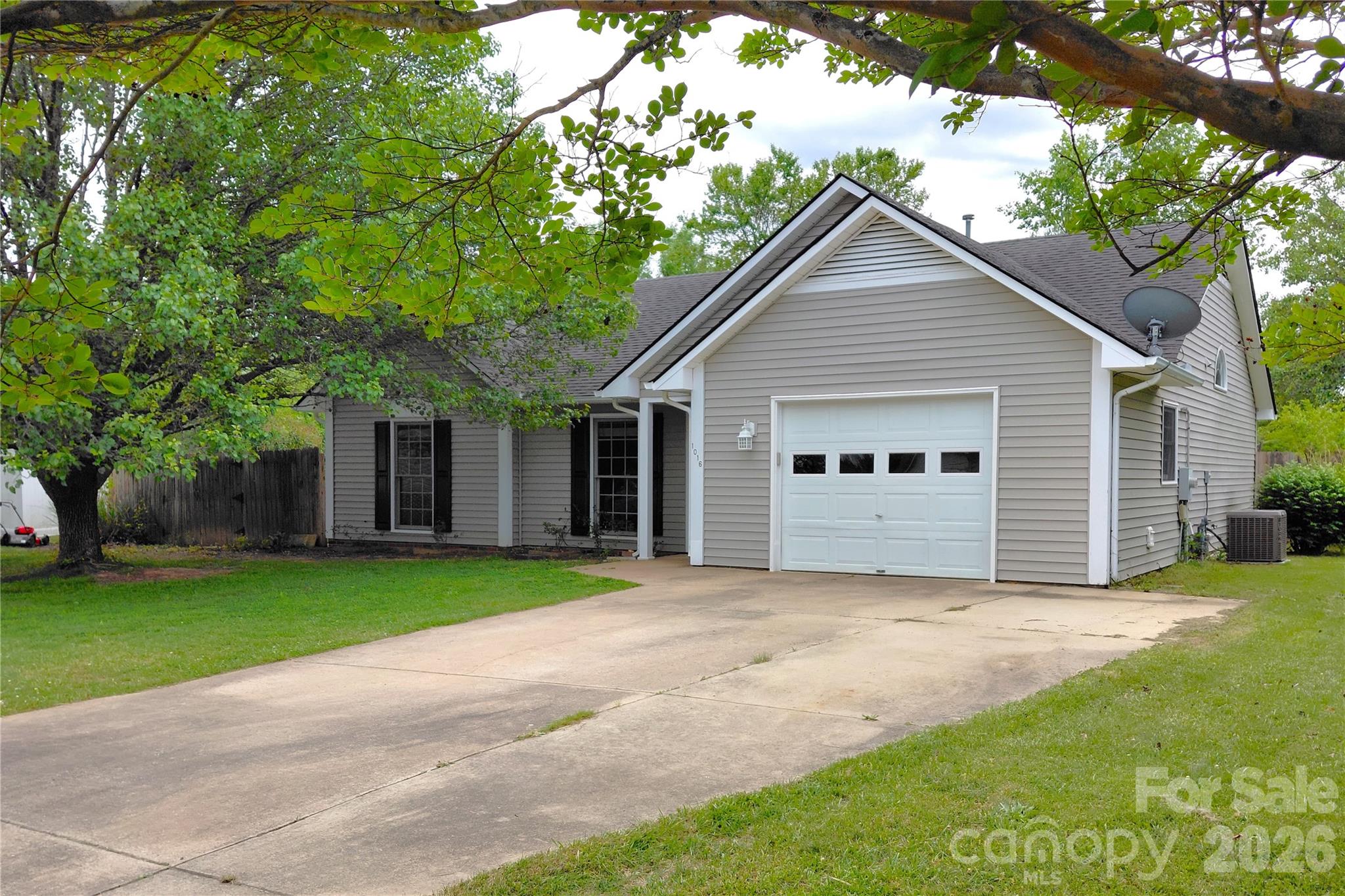 Back on Market - buyer choice - no inspections completed.  Southchase is a popular Fletcher neighborhood; a fan favorite because of its super location midway between Asheville and Hendersonville, no HOA-no covenants-no dues, and great value!  This home offers a familiar floor plan with a split bedroom layout, comfortable single-level living and attached garage. Zero-threshold design at all entry points, plus a level walk-off patio, extending without steps into your private, fully fenced backyard, great for play, pets and gardening –  with fruit trees and raised beds in place. You’ll be just minutes from Fletcher Park, renowned for its  ball fields, walking track and greenway along the creek, offering at least two miles of walking trails.  The convenience, comfort, and lifestyle is hard to beat! Ready and waiting for you!  No damage from Hurricane Helene.