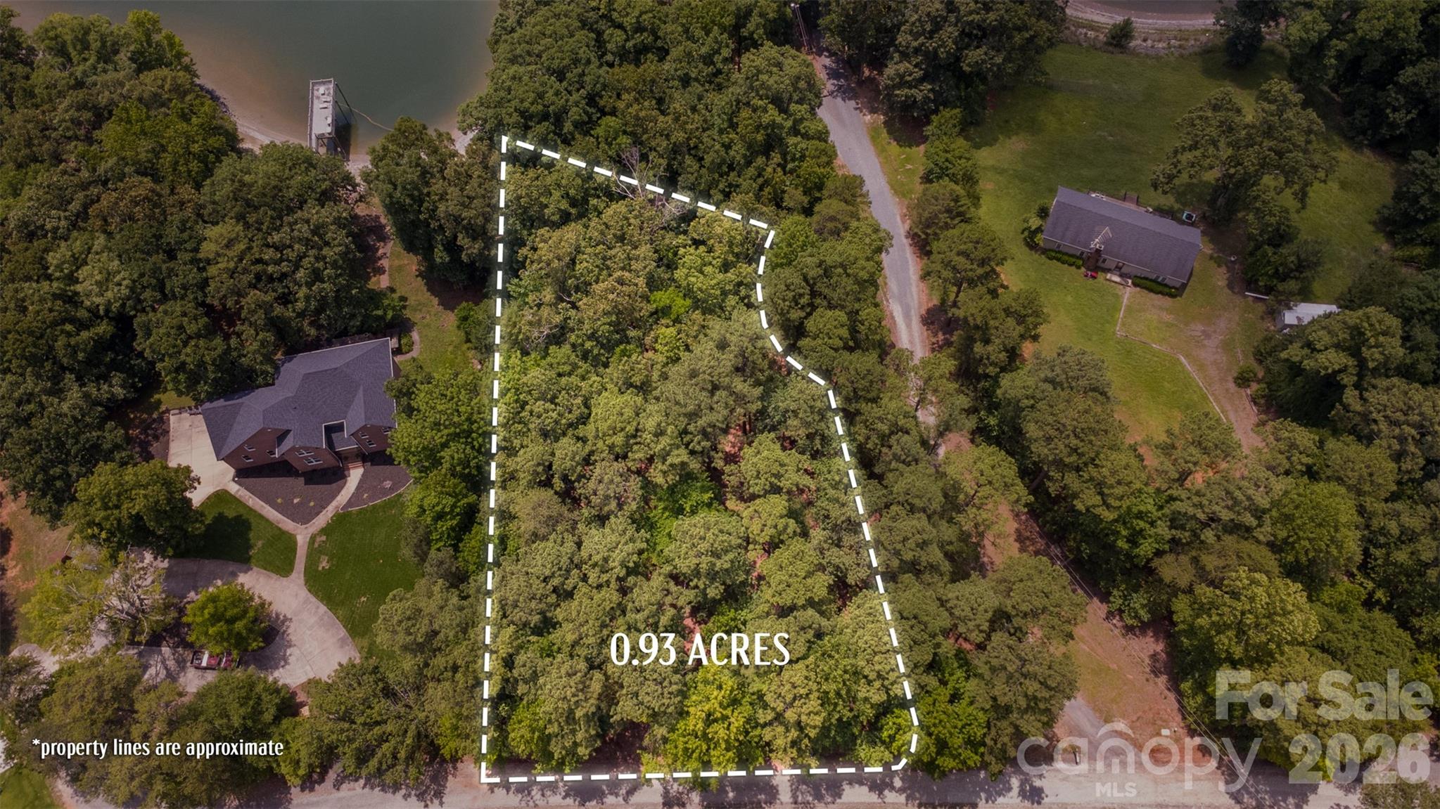 Nearly one acre overlooking the main channel of Lake Wylie, this exceptional homesite offers the perfect setting to build your custom dream home. Enjoy breathtaking water views, spectacular sunsets, and the peaceful beauty of nature from your own private retreat.

Located in one of the area's most desirable and growing communities, the property is just minutes from the new Lake Wylie High School and convenient to shopping, dining, and everyday amenities while still offering a sense of privacy and tranquility.

Just a golf cart ride away, Commodore Yacht Club offers one of Lake Wylie's premier marina experiences. Enjoy convenient access to covered boat slips, dry storage, trailer parking, a private boat ramp, and a beautiful clubhouse. Whether you're an avid boater or simply love the lake lifestyle, this exceptional nearby amenity makes it easy to enjoy everything Lake Wylie has to offer.

Opportunities like this are rare. Bring your builder, your vision, and your personal touches to create the private oasis you've always imagined on this beautiful waterview lot overlooking Lake Wylie.
