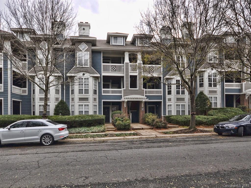 Two story, top floor Dilworth townhome in walking distance to South End and the light rail.  Pre-finished hardwoods in living room, dining room and kitchen.  Carpet in the bedrooms. Kitchen with granite counters and stainless steel appliances. Vaulted ceiling, built-in cabinets and fireplace in living room.  Wood blinds throughout. Storage closet off porch. Pool and clubhouse.