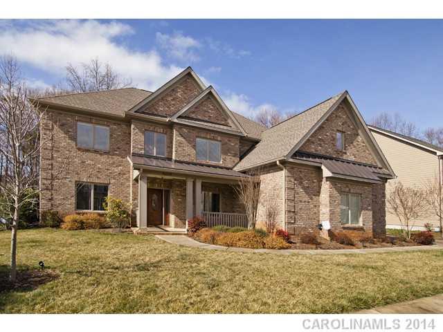 MOTIVATED SELLERS!!! You will not find a better value for a TRUE-CUSTOM home in a PRIME location, LOADED with upgrades. Great room has coffered ceilings and a dual-side stone fireplace. Gourmet Kitchen has granite counters, double ovens and plenty of storage! The large master en suite is a perfect owners retreat! The third floor has a large rec room and wet bar! Close to Birkdale, shopping, restaurants and just minutes to Lake Norman.  PRICED TO SELL QUICKLY at $93/sf!!!