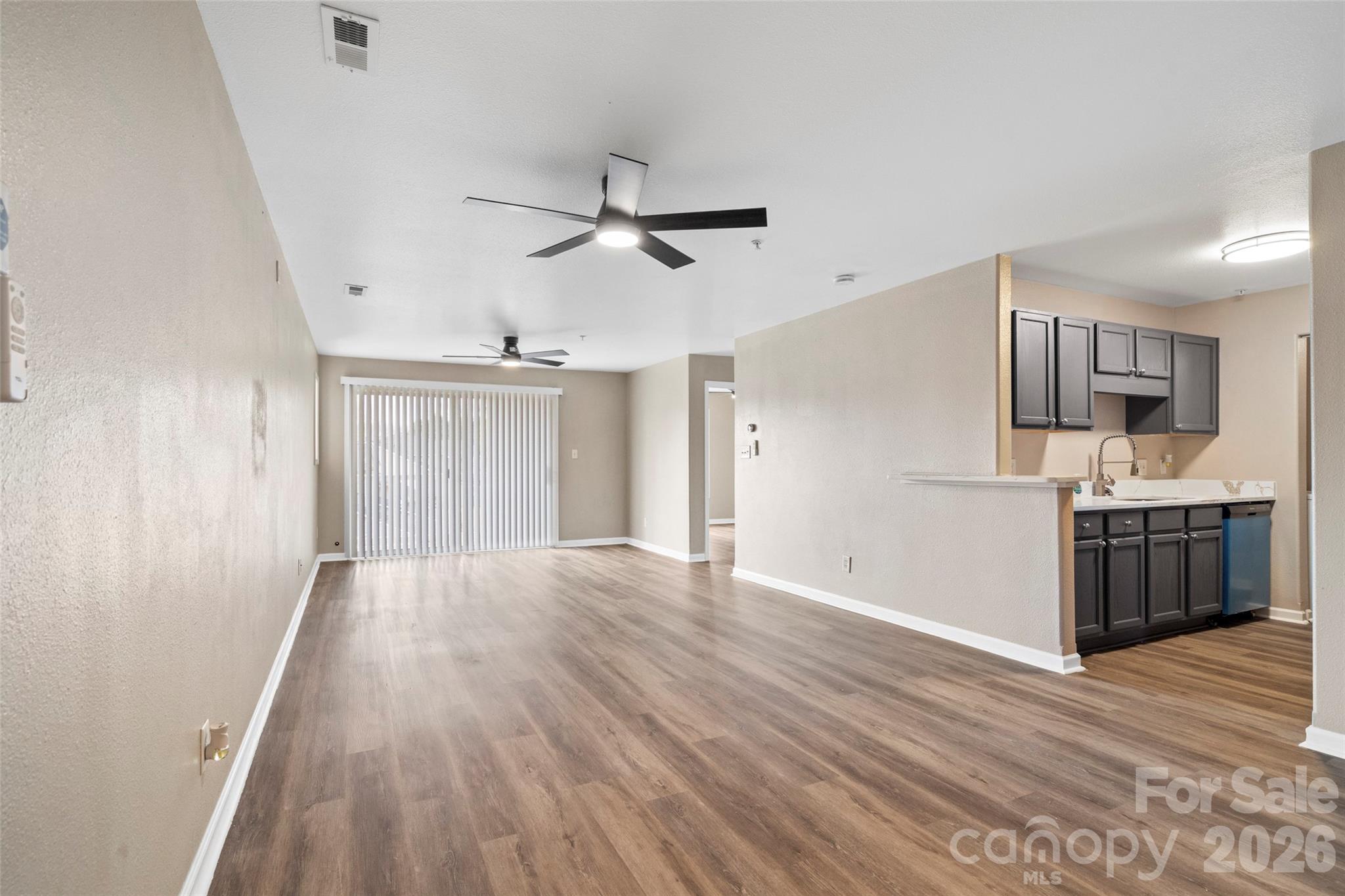 Experience elevated living in this fully remodeled third-floor residence, minutes from Uptown Charlotte. Bathed in natural light, the sunlit primary suite features oversized windows for serene mornings and quiet evenings. The interior has been thoughtfully refreshed with crisp paint and waterproof LVP flooring, creating a seamless, contemporary palette throughout.
Entertain in a stunning, chef-inspired kitchen finished with luminous quartz countertops, a large farmhouse sink, new stainless appliances, and elegant nickel fixtures. Both bathrooms echo the same refined aesthetic with quartz surfaces, designer lighting, and modern hardware. Home has a new queen bedroom set, sectional living room set with live edge tables and a custom dining table all included with the sale of this unit!!!!
Relax on your covered patio—an intimate outdoor retreat that includes a private storage closet—and enjoy community luxuries such as a sparkling outdoor pool and a stylish clubhouse available to owners and renters. Perfectly situated near Plaza Midwood and NoDa with easy Light Rail access, this home blends comfort, style, and convenience in one of Charlotte’s most desirable neighborhoods.
Schedule your private tour today and discover effortless, sophisticated living.